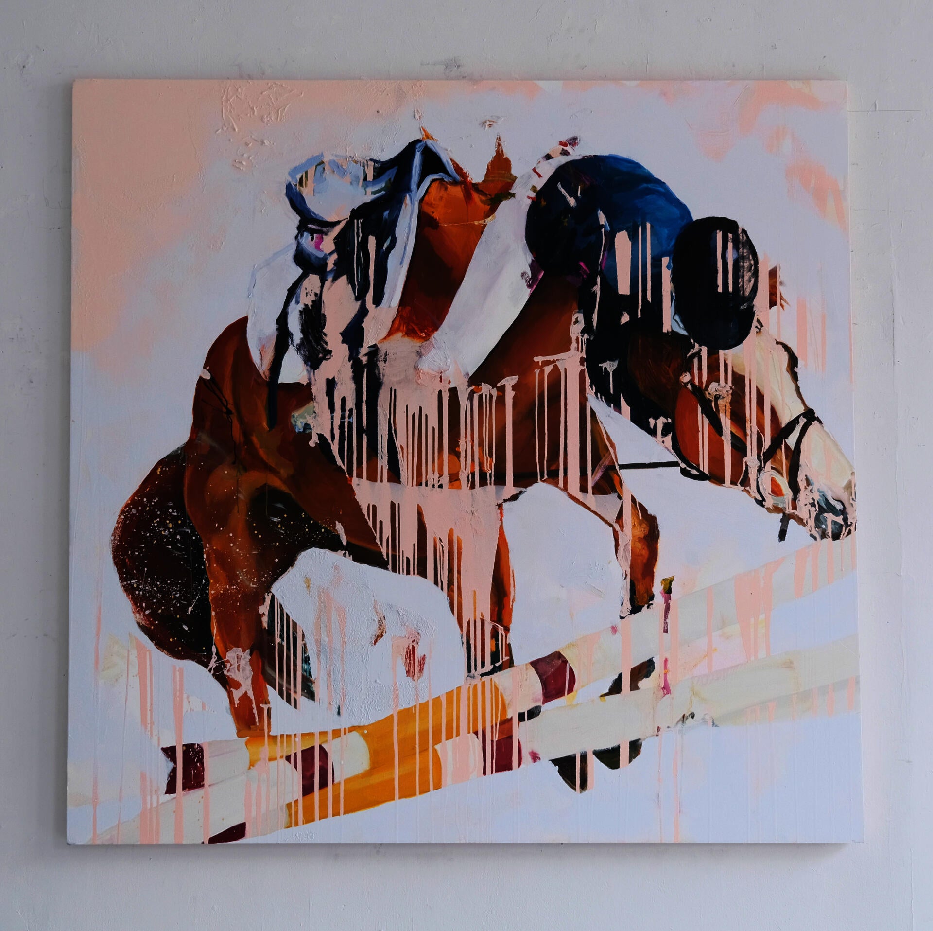 A square painting with an expressive image of a horse and rider falling over a jump.