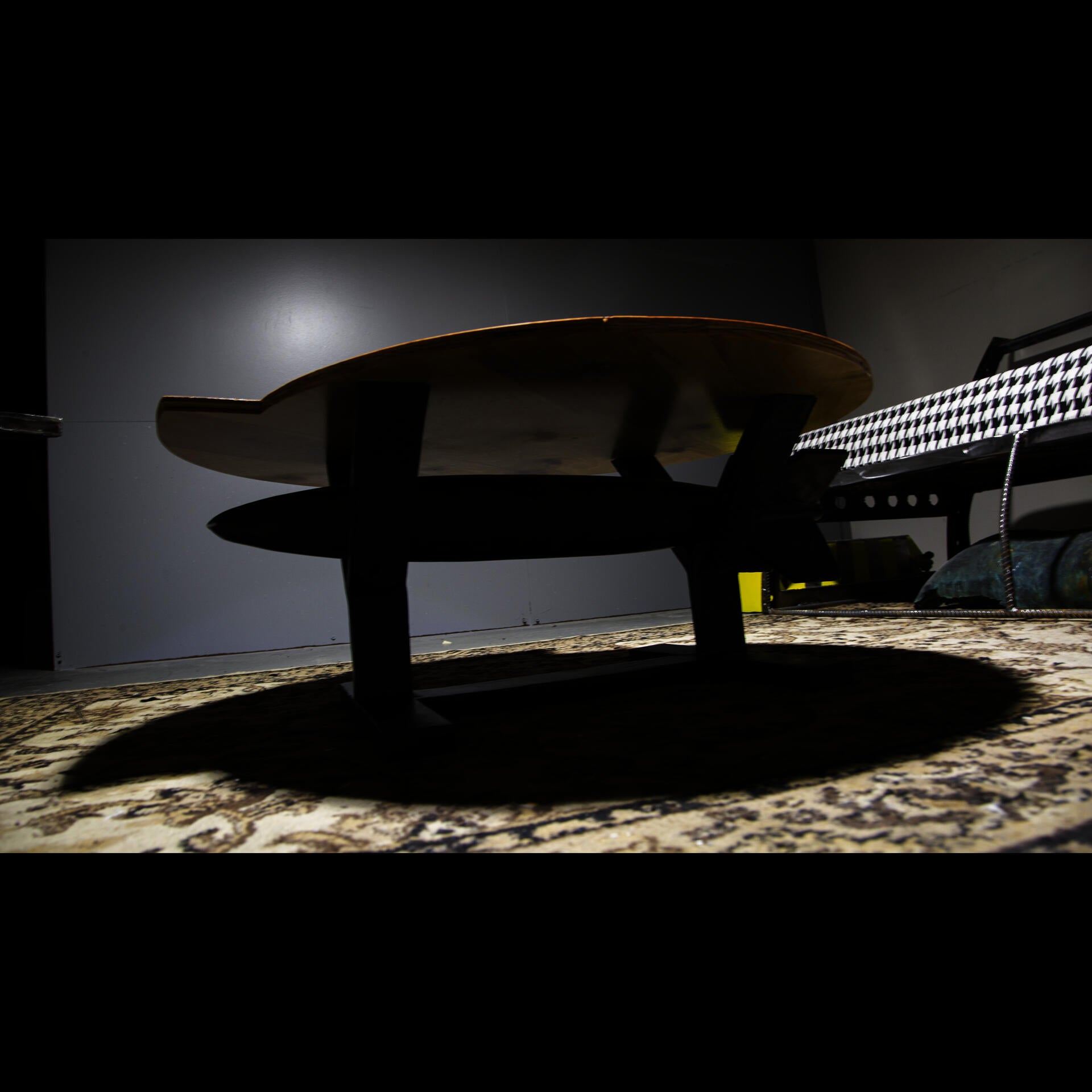 Coffe table holding a reimagined carbon fiber joint direct attack munition