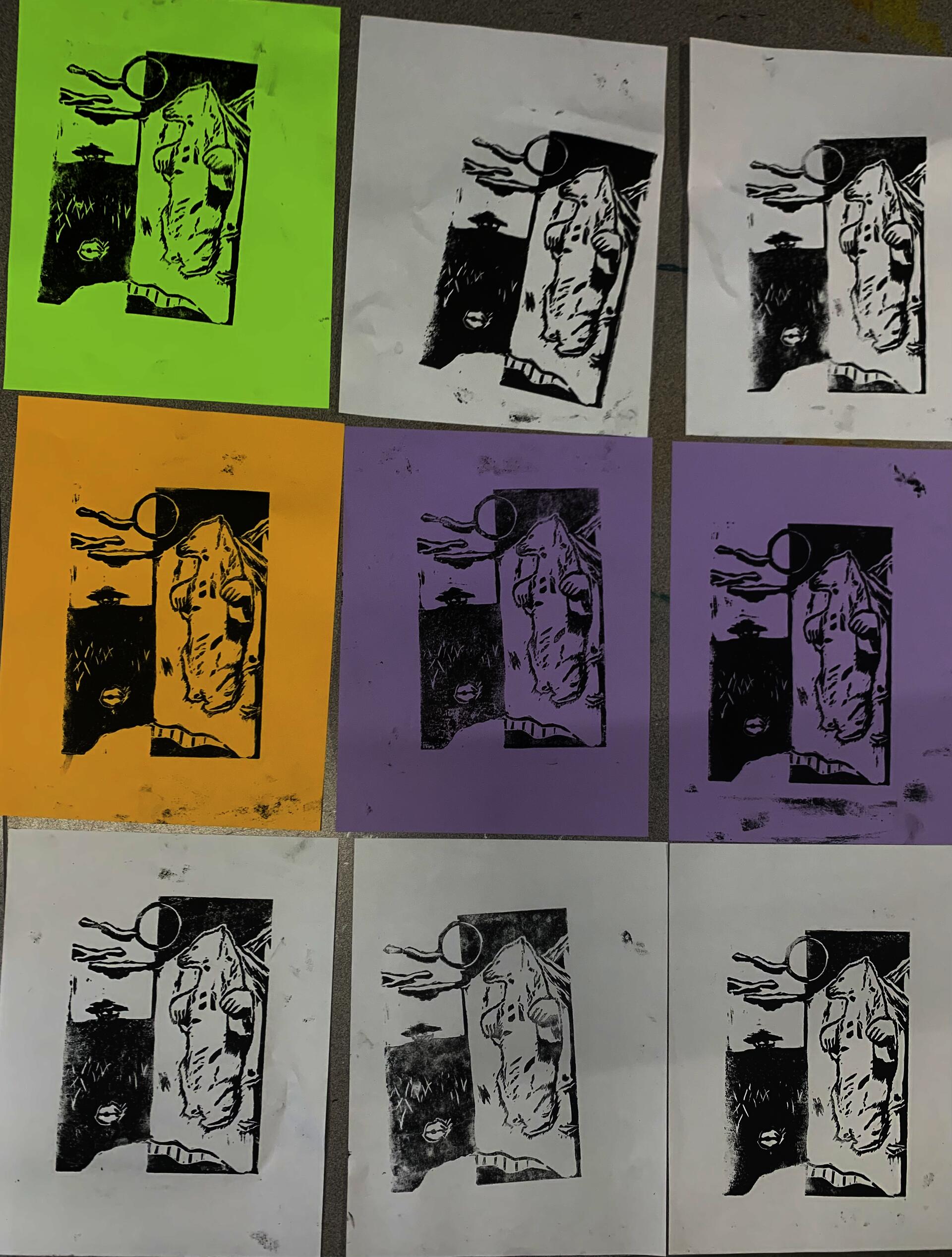 Various colored linocut blocks that have animals on them