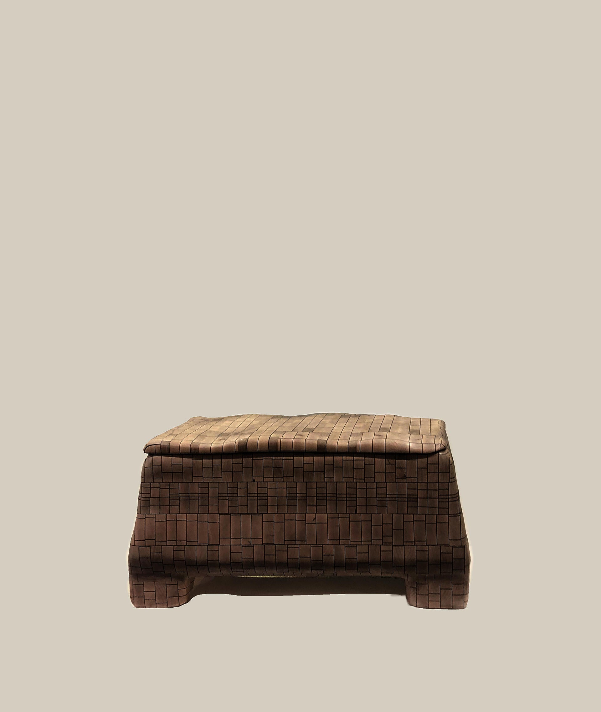 A Hope Chest made from a process of repetition using stack lamination of maple and black dyed poplar, manipulation of a familiar grid, hand carved. Familiar in form but seeking to break with tradition yet still find meaning in it..