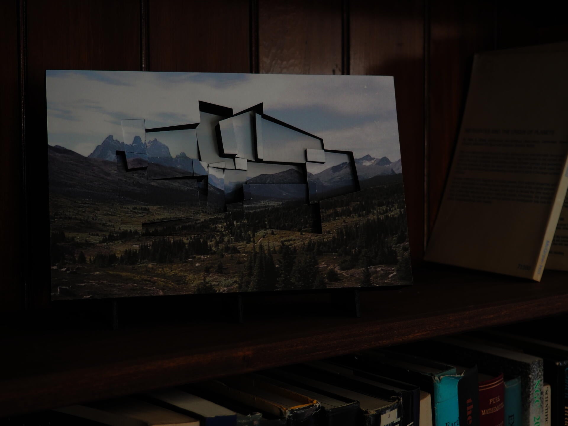 A mountain valley deconstructed into collapsing planes. 