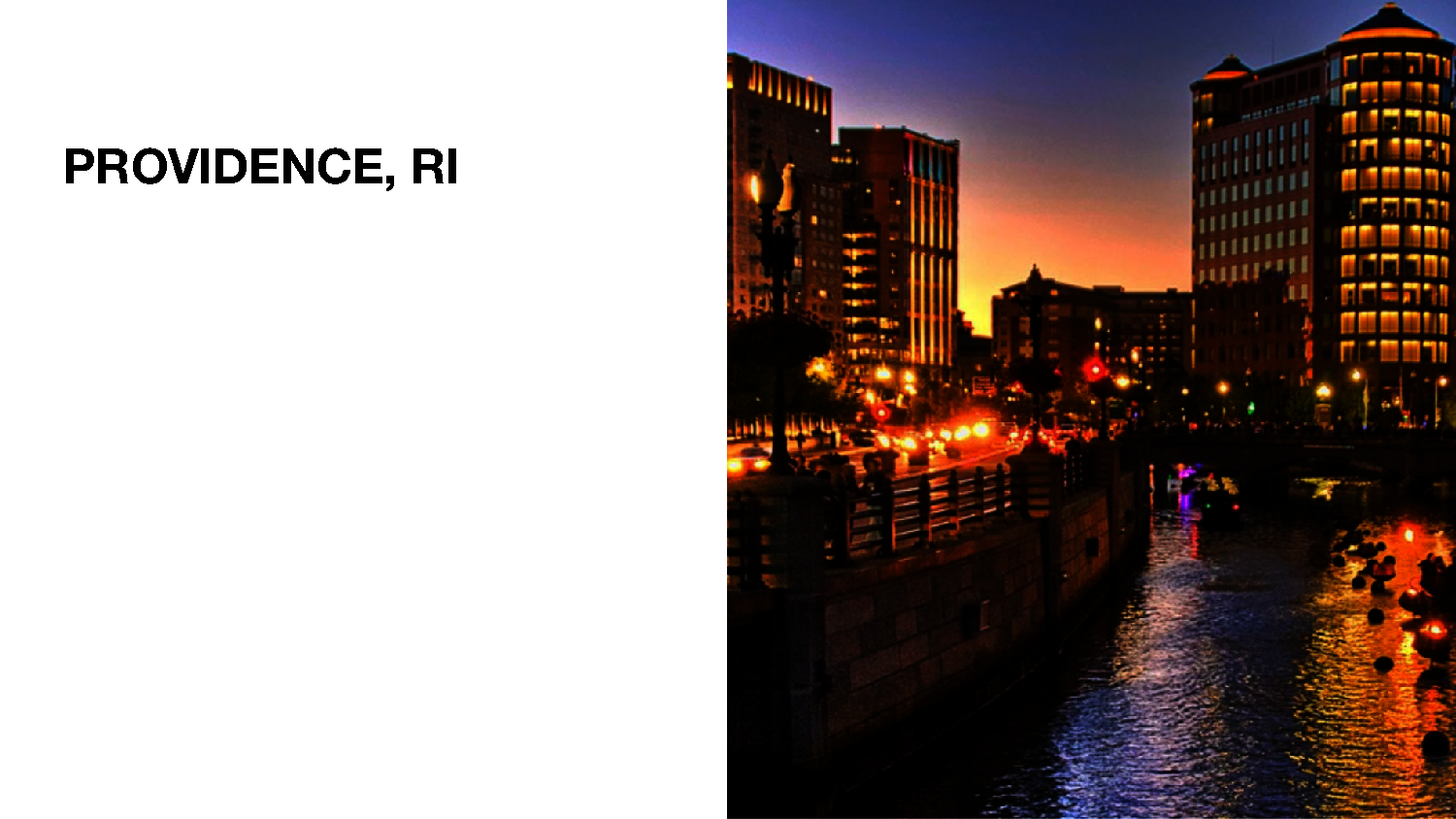 A Picture of Fire basins in the Providence Canal with the city lights around it.