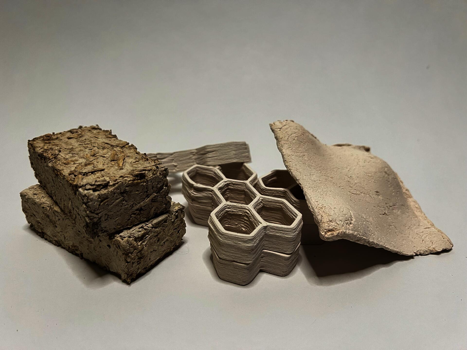 Material exploration emphasizing the versatility of hemp using clay as binder. Seen here is brick using hemp hurd, building block using hemp powder, and panel using hemp fiber.