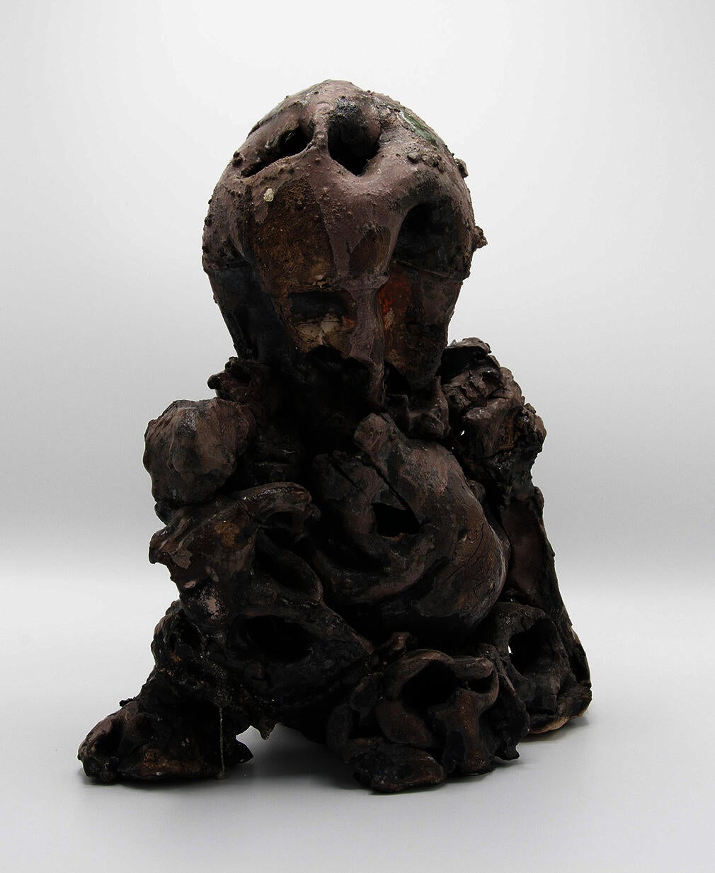 Abstract figure made from piled ceramic shapes