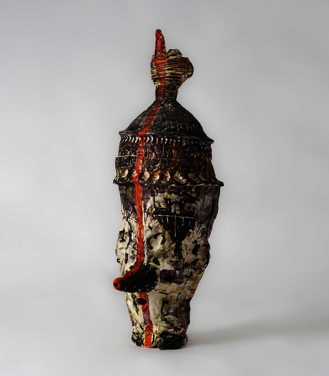 Large, ceramic jar covered in imagery with ceramic printed Yad adorned lid