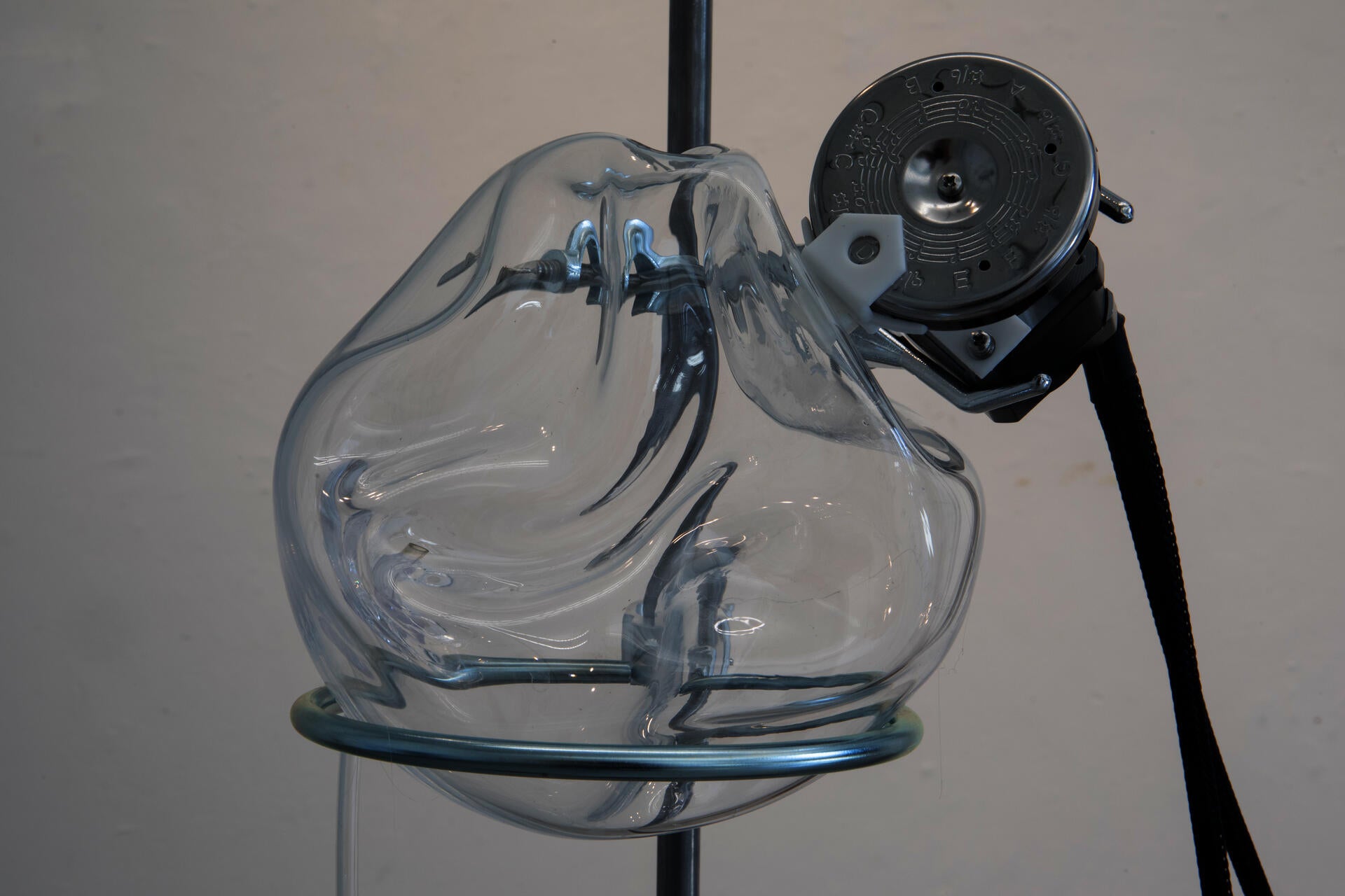 Glass orb with pitch pipe.