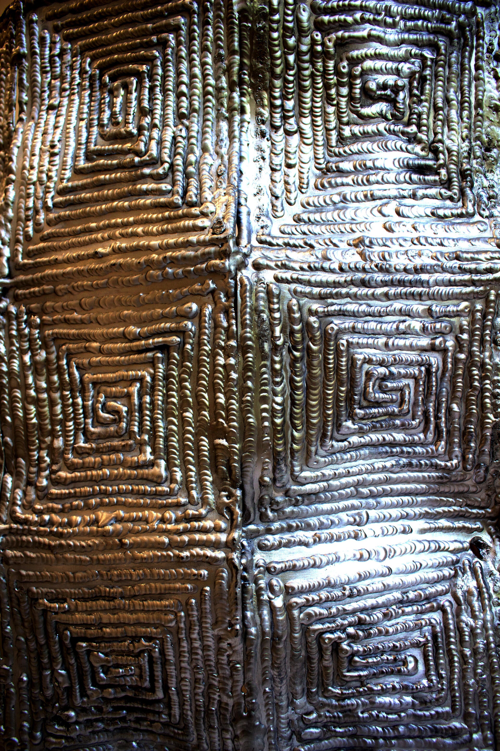 Close-up image of the surface of aluminum lamp shade