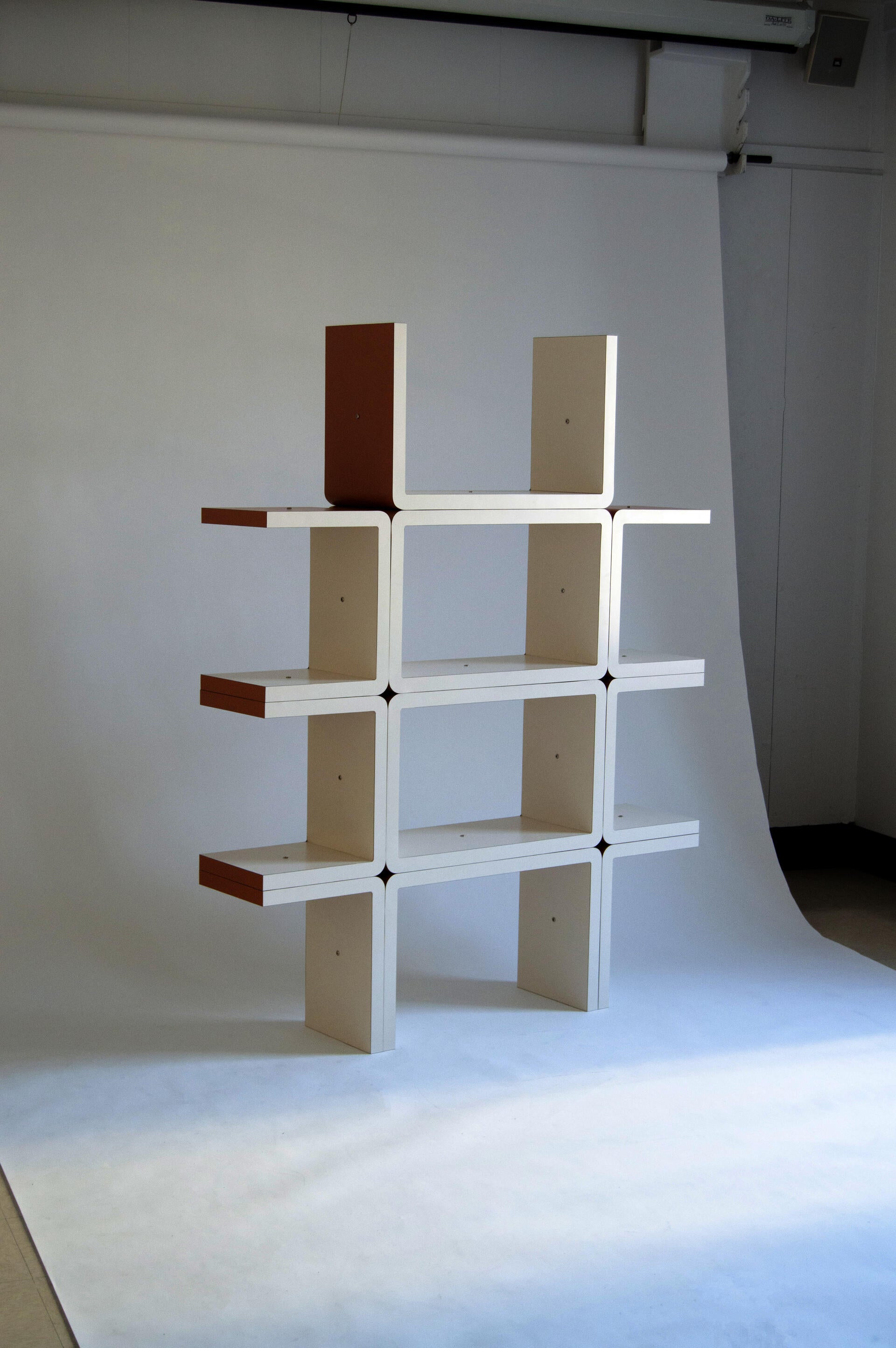 A modular shelving system that re-considers design and architectural references from the 60s/80s in a contemporary context.