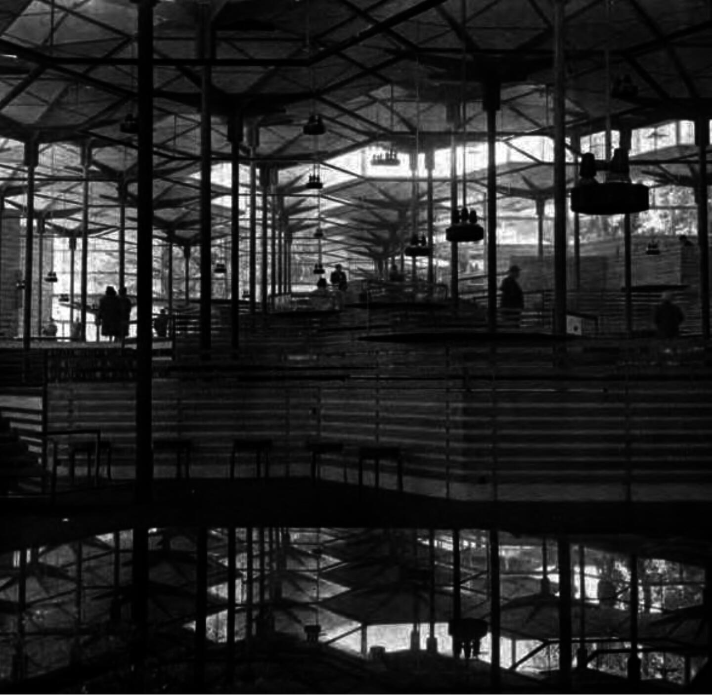 Interior of the Spanish pavilion at Expo 58 with columns resembling palms.