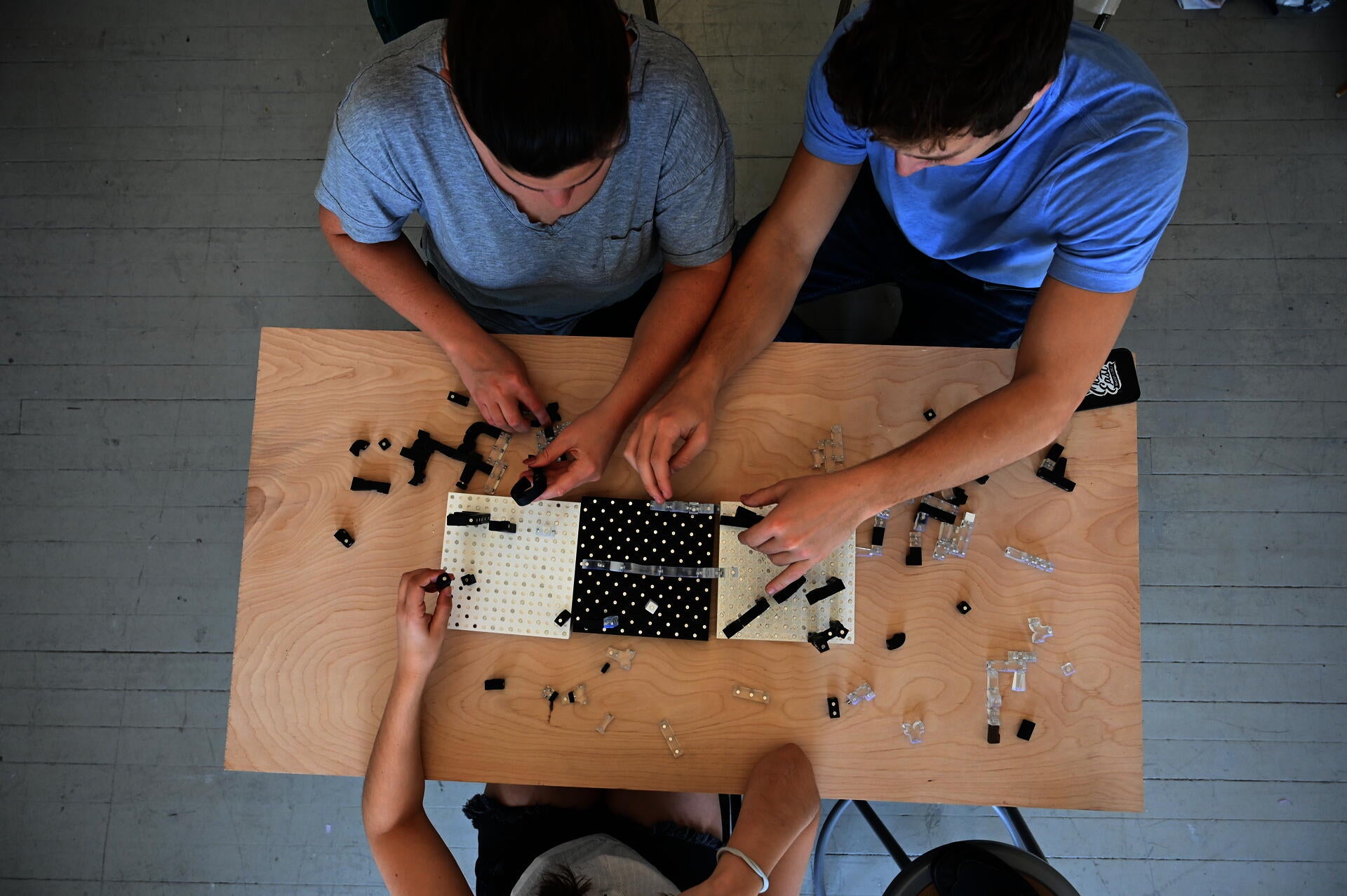 People playing with block pieces