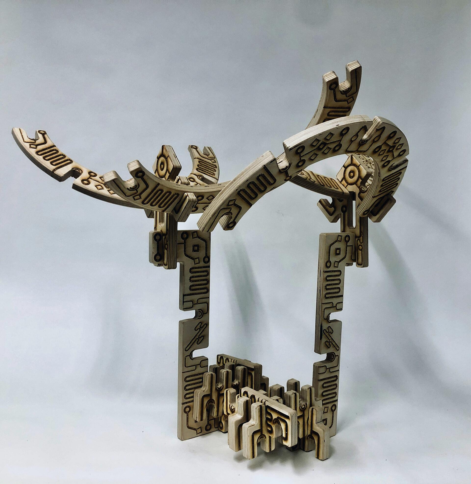 Kole is a building language influenced by the cross culture representation of the African Diaspora. The wooden set is meant to challenge with scale and tactile.