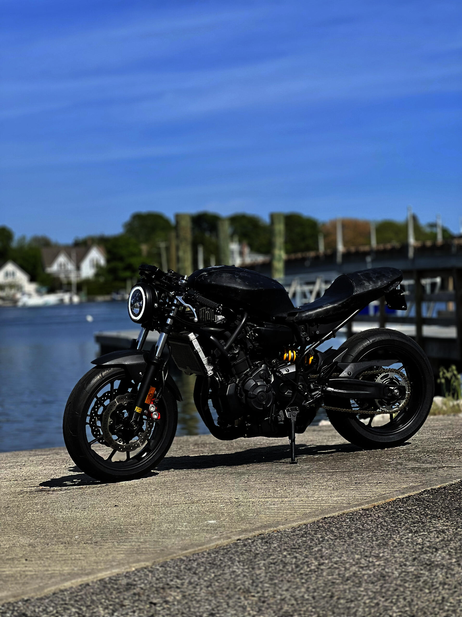 Custom motorcycle at a bridge