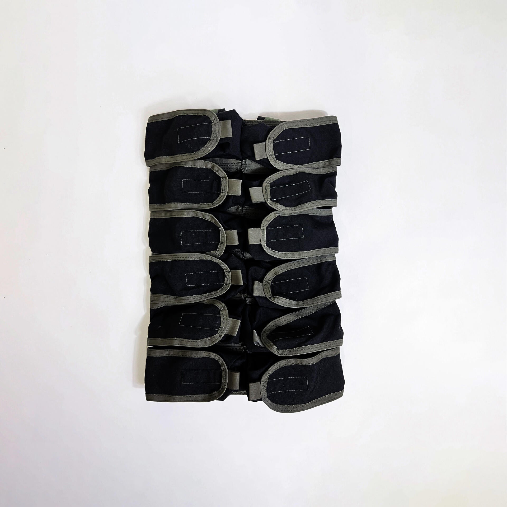 Life can sometimes feel like a battlefield. Running out of sodas during a trip with friends can make people sad. Then there is the Soda Warrior, enabling you to carry 12 sodas for your friends. The Soda Warrior draws inspiration from the Paraclete assault back panel, extracting features like multiple pouches, curved edges, bindings, and side openings. It uses contrasting colors to highlight these elements, enhancing its utility and style.