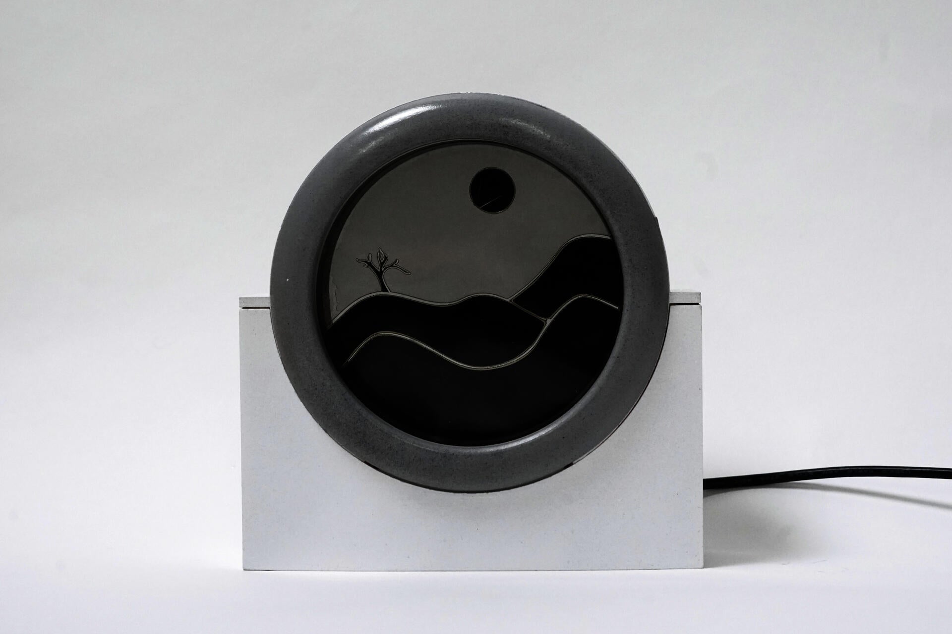 A white timer with a grey bezel and semi-transparent dial