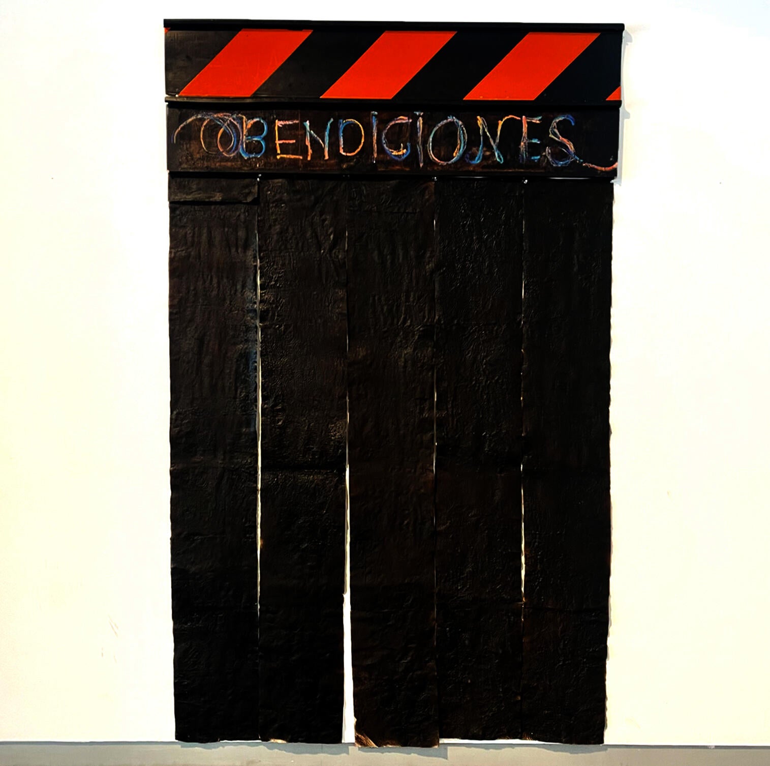 plastic and wooden planks with paper towels hanging