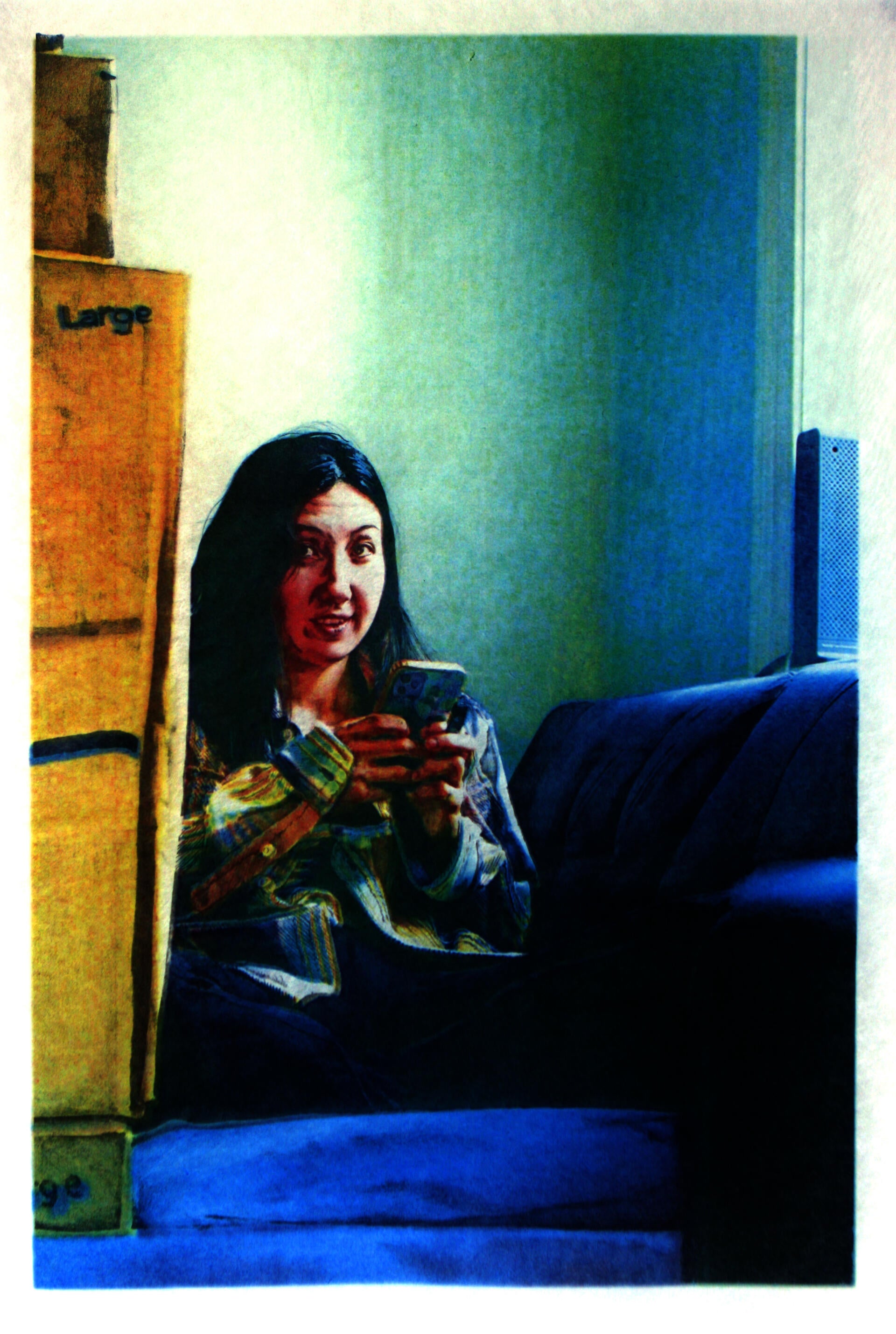 Figure looking up from a mobile phone