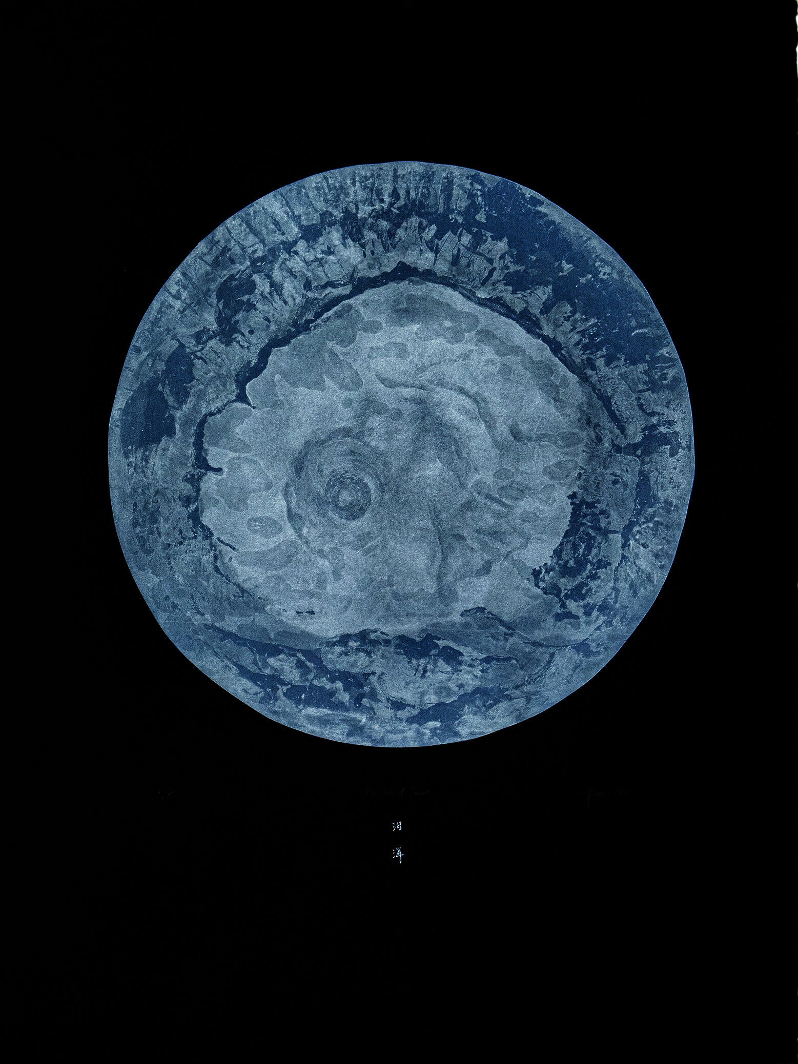 A light blue and silver moon, printed in intaglio on black paper