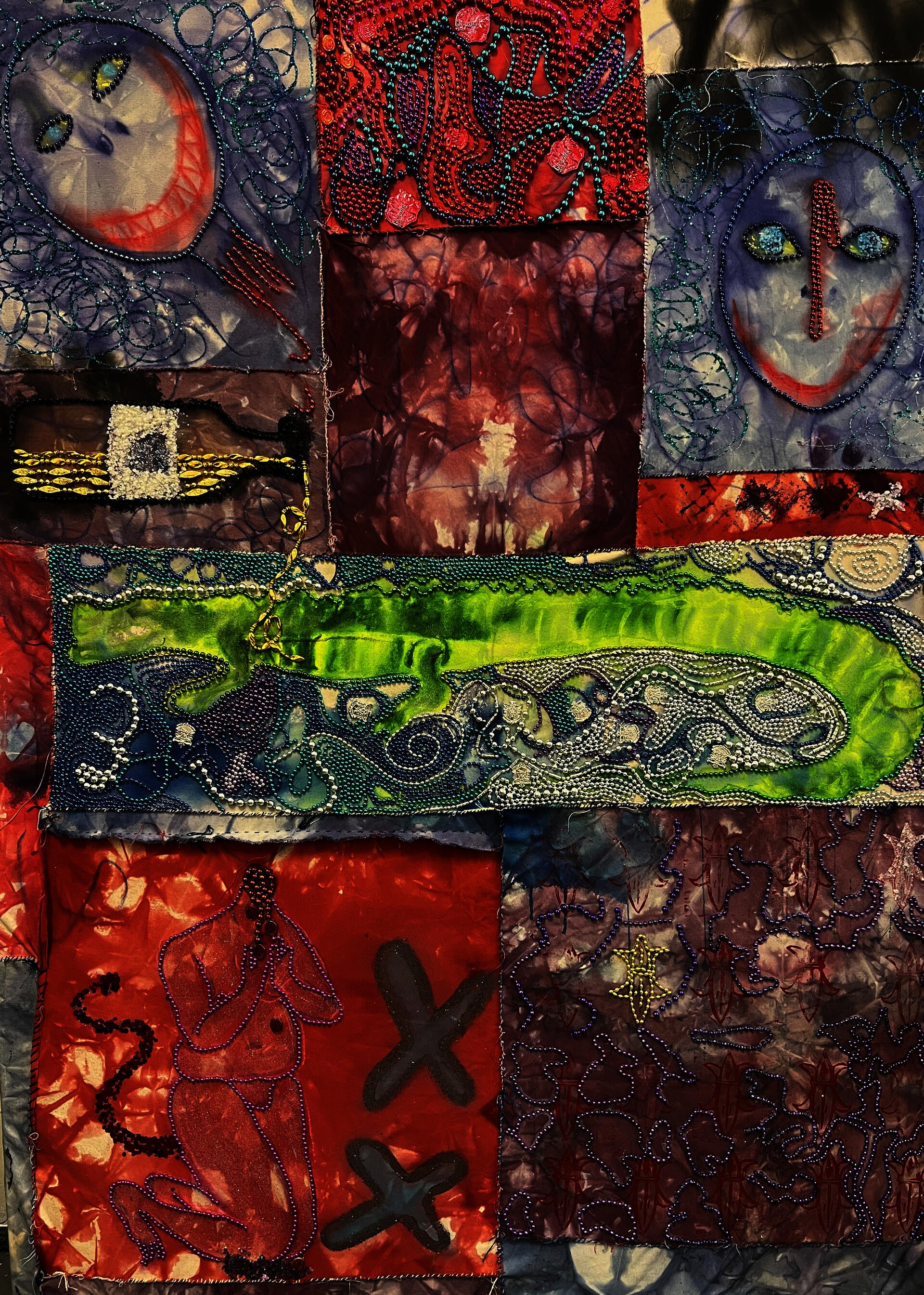 Painting with stitched pieces of dyed fabric and Mardi Gras beads.