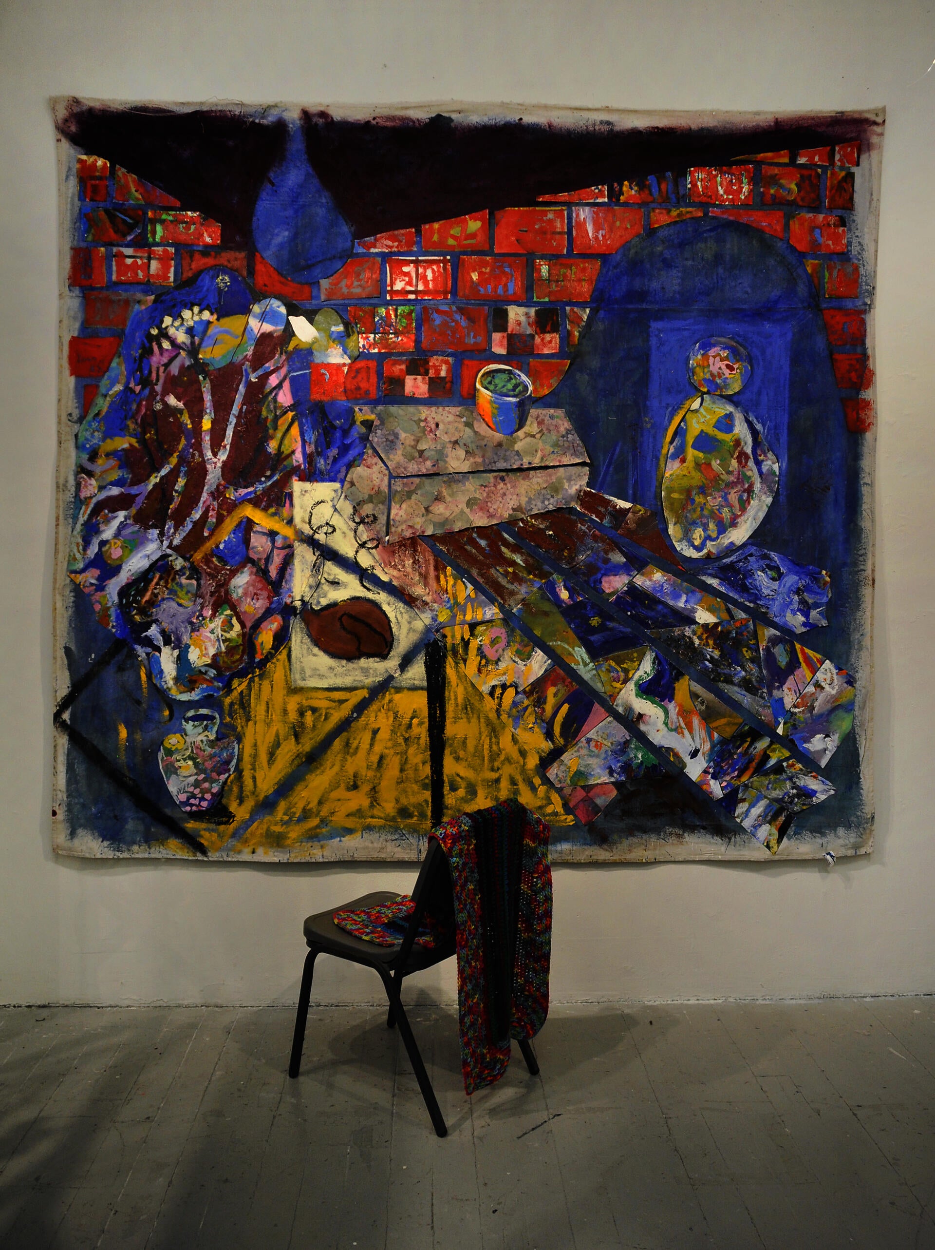 Abstract table with food and figure in doorway.