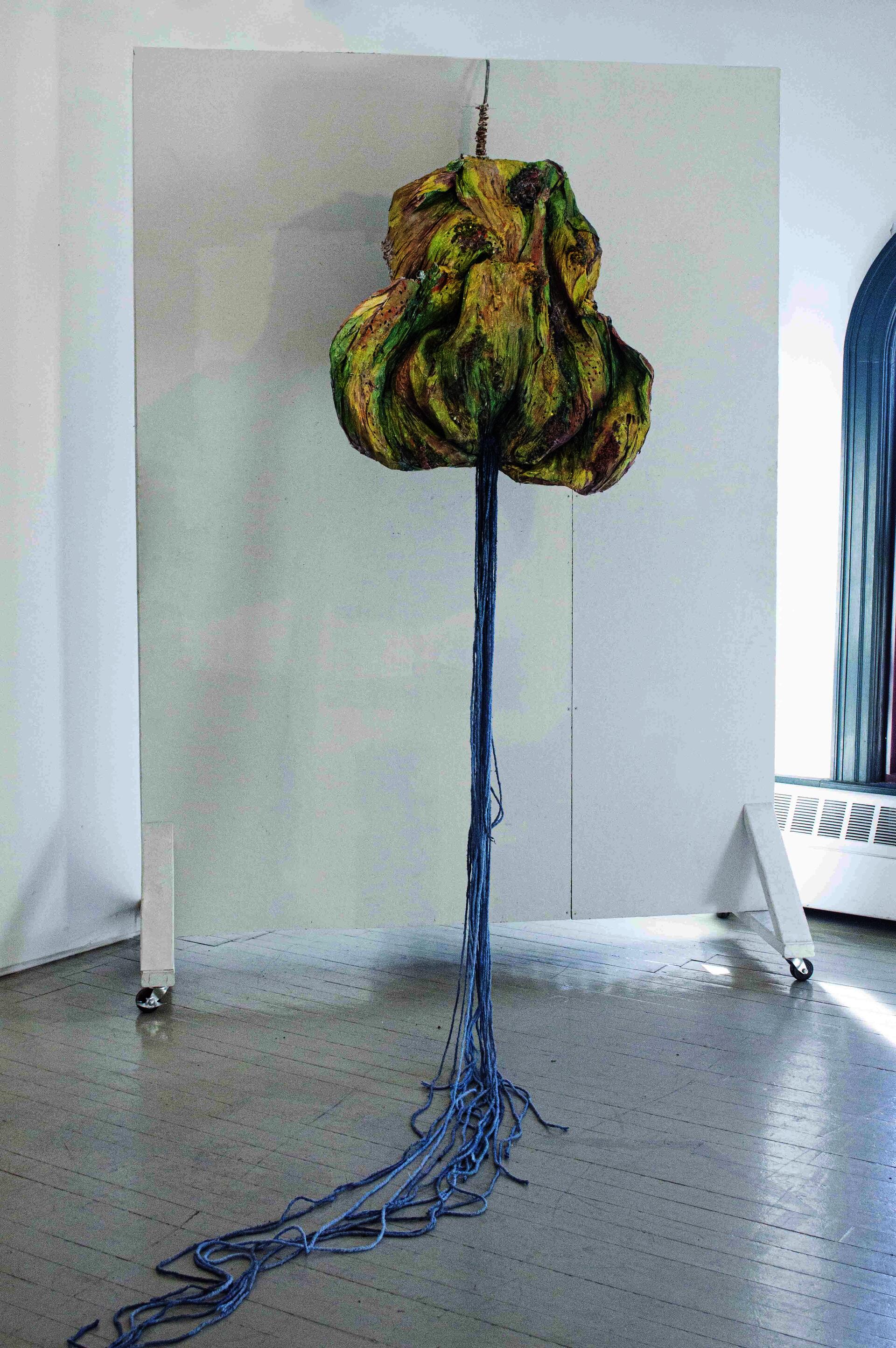 2022. Plastic bags, acrylic and spray paint, steel wool, architectural bushes, latex, mop rope, scrap 35 x 47 in (top piece) + 129 in (mop rope)