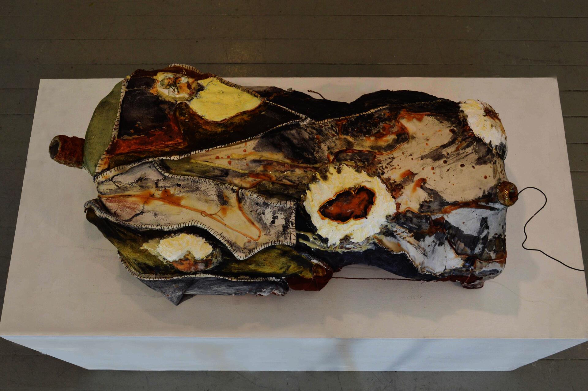 2022. Sponge foam, fabric, latex, scrap, turmeric, black dye, iron oxide, and oil paint