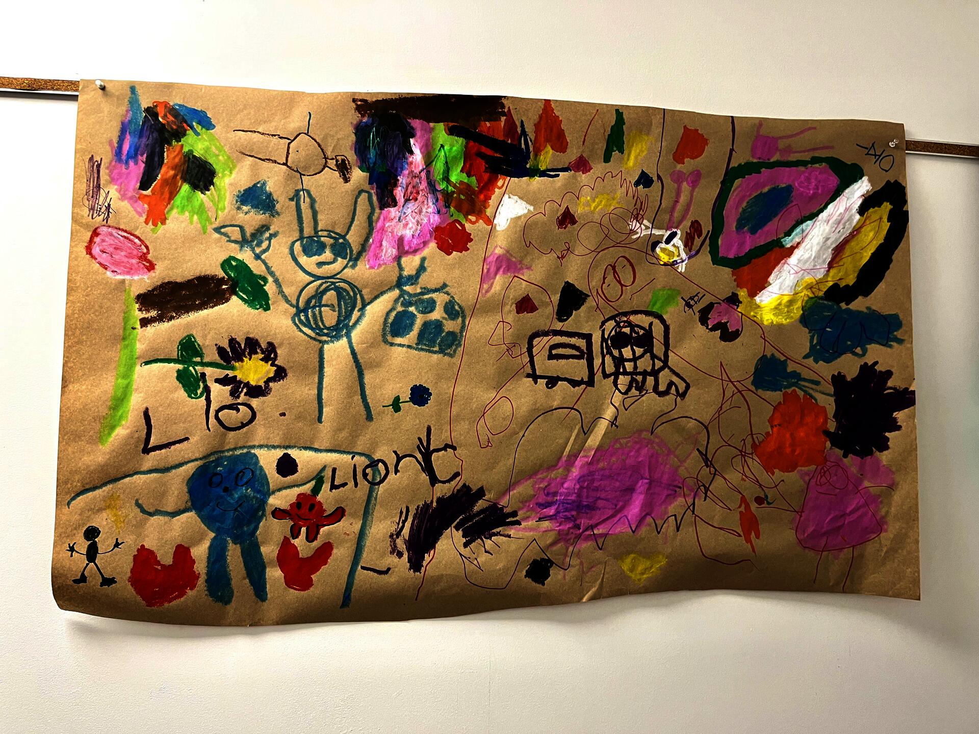 Pre-K students at Colt Andrews Elementary School work collaboratively in exploring Qwik Stiks as a new material. Photographed by Allison Neslund.