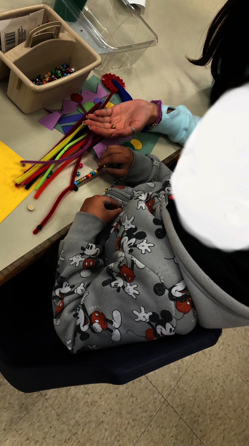 Intensive Special Education (ISE) class at Hugh Cole Elementary School working at stations with various sensory materials. Photographed by Lynne Ramos.