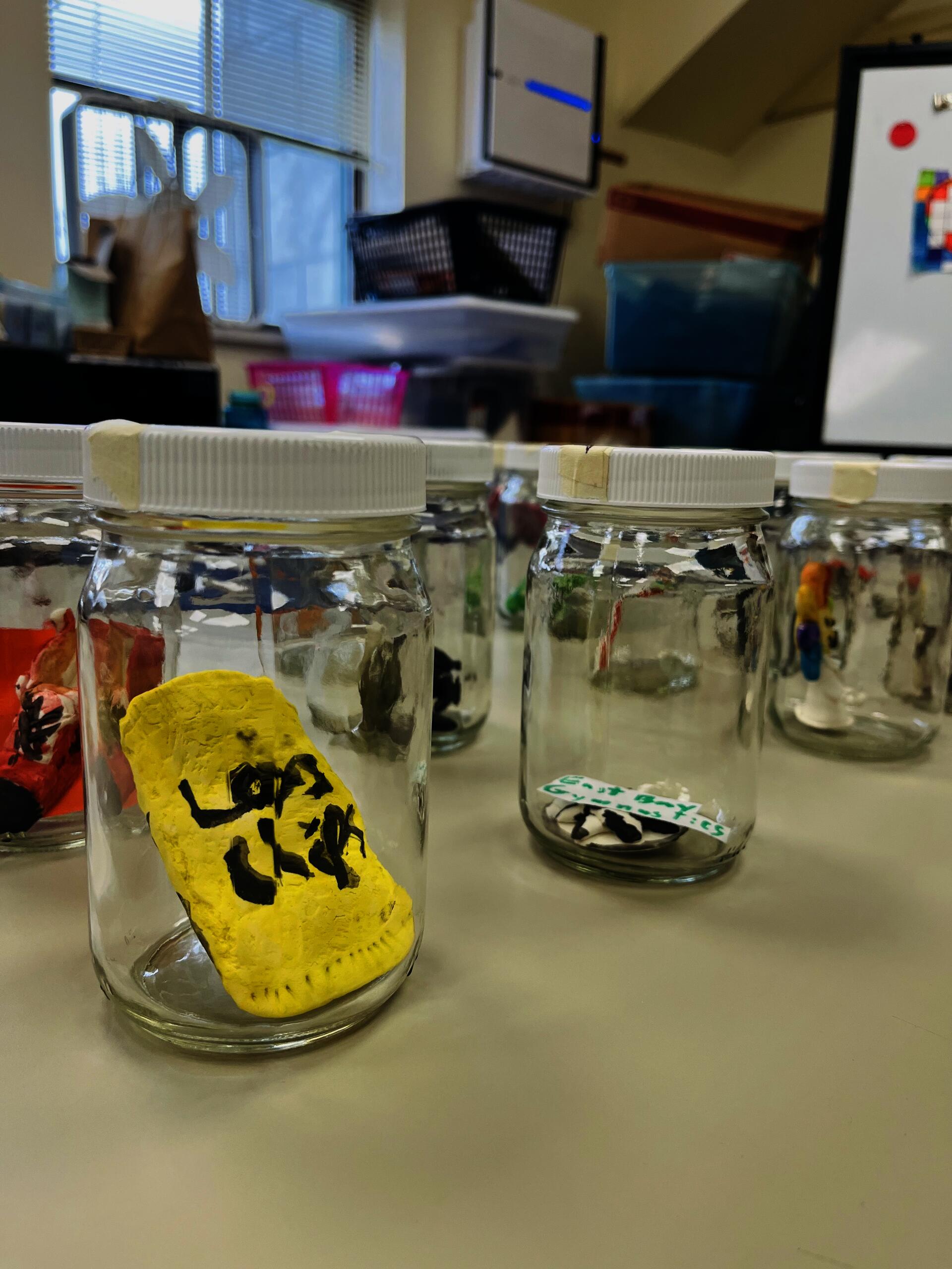 Grade 5 students at Colt Andrews Elementary School create miniature Model Magic sculptures that tell us about who they are. Close up photographed by Allison Neslund.