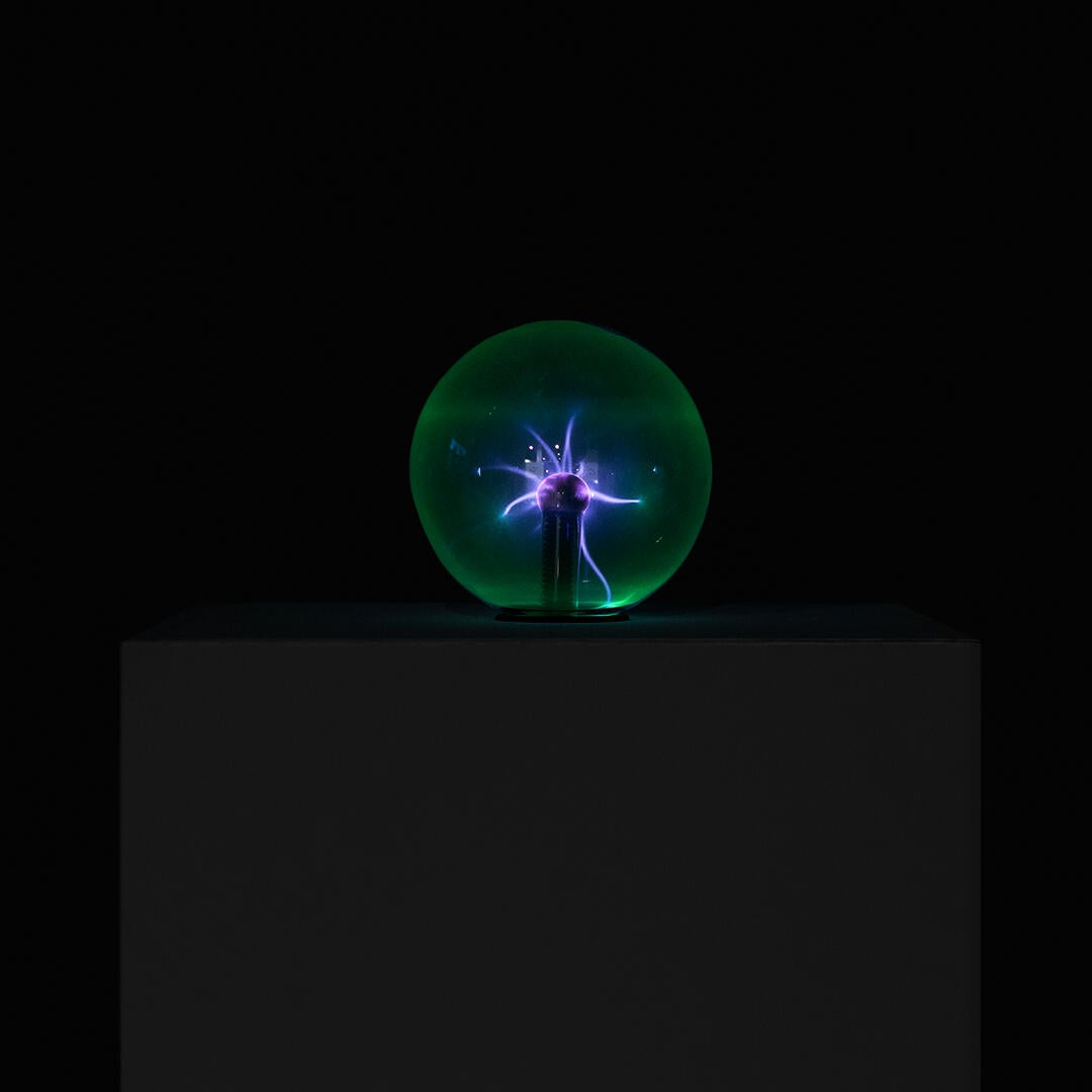 A green lightning ball with a shrill noise.