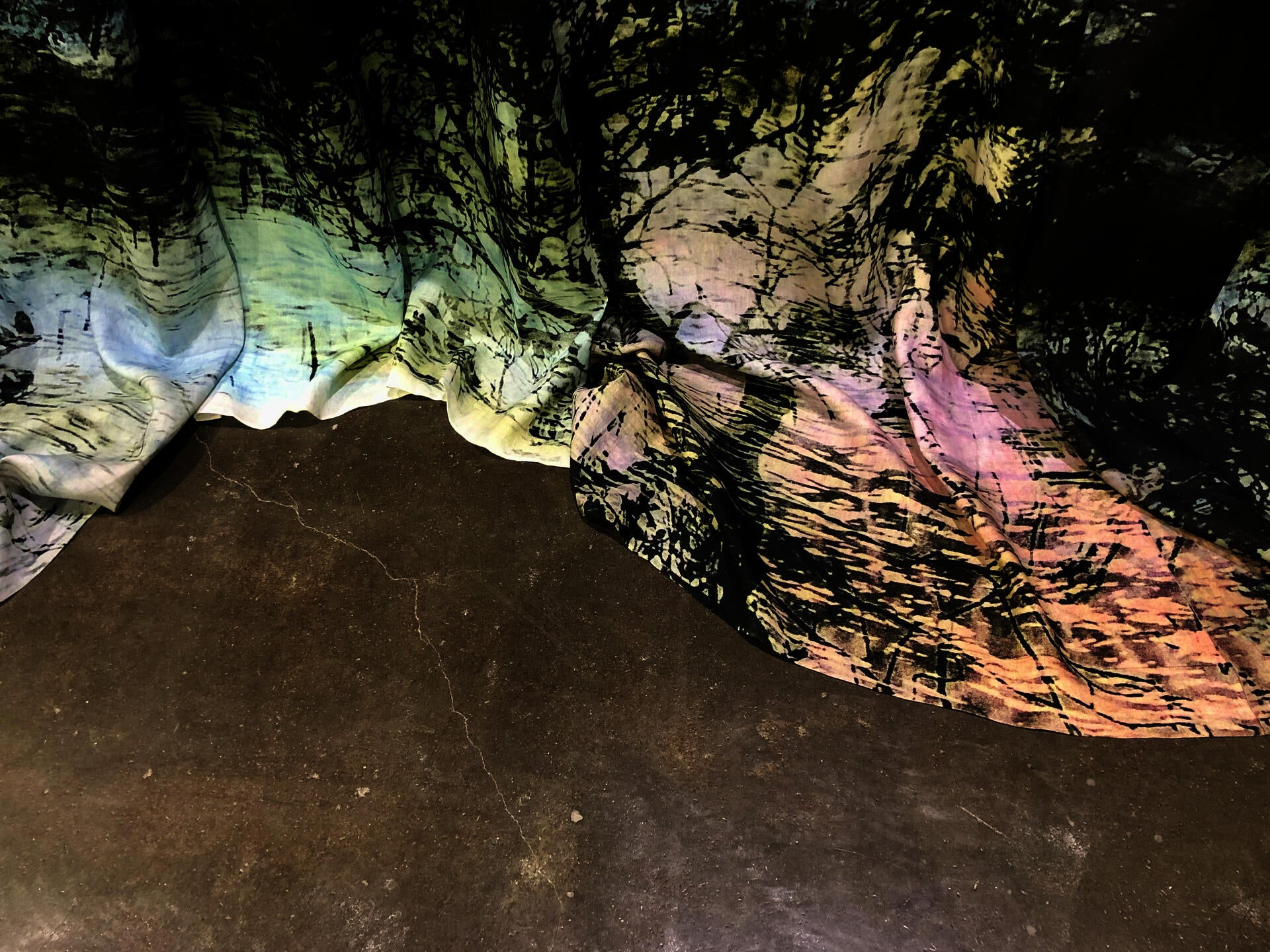 photograph and charcoal printed on fabric and paper, shot over and over again - on sublimation dye printed and steamed linen
