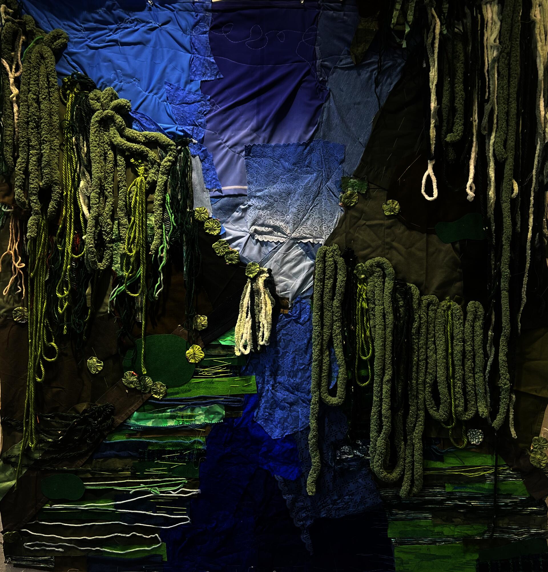 Swamp Textile landscapes of found blue and green fabric and Yarn