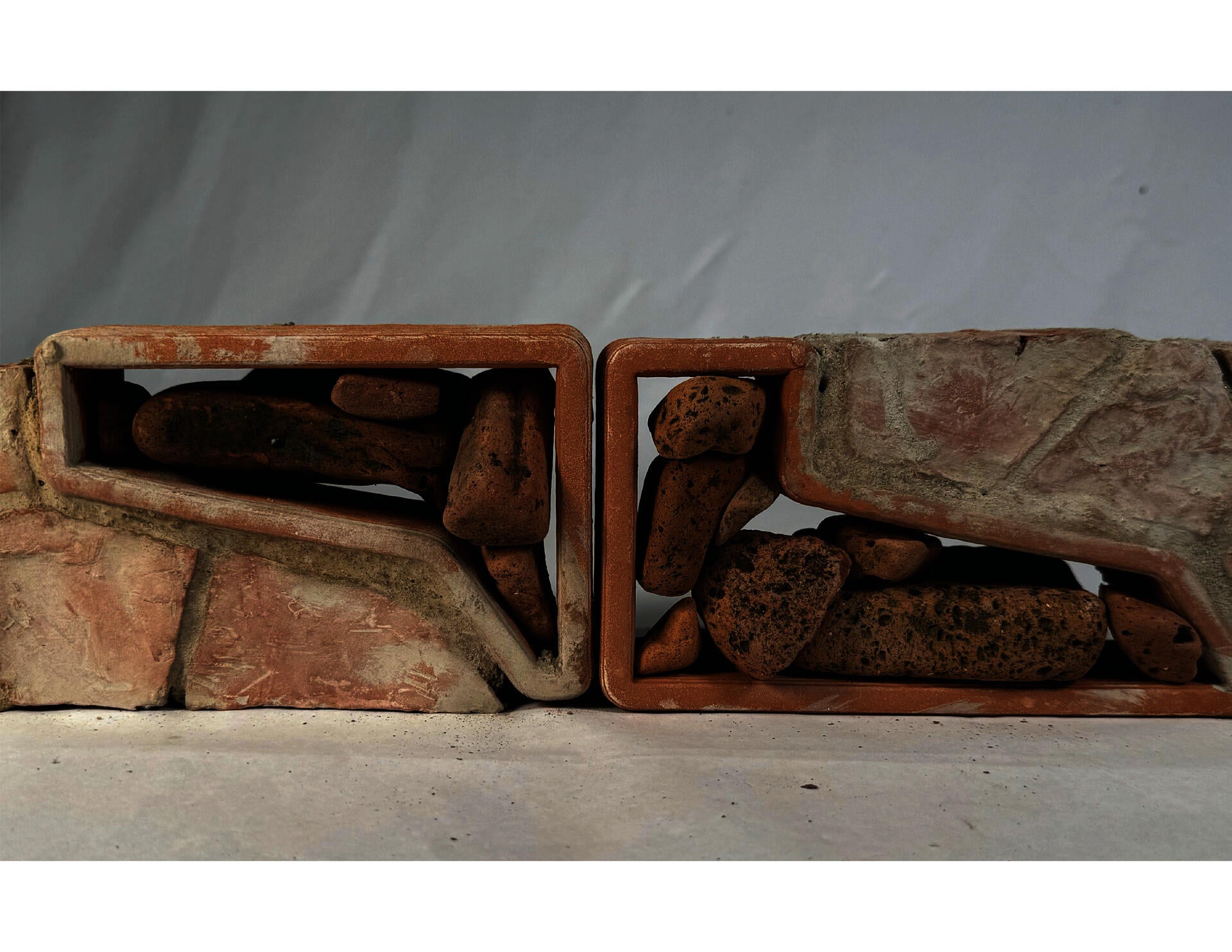Image is of a prototype of the the brick themselves showing how the rubble is stacked within the form.
