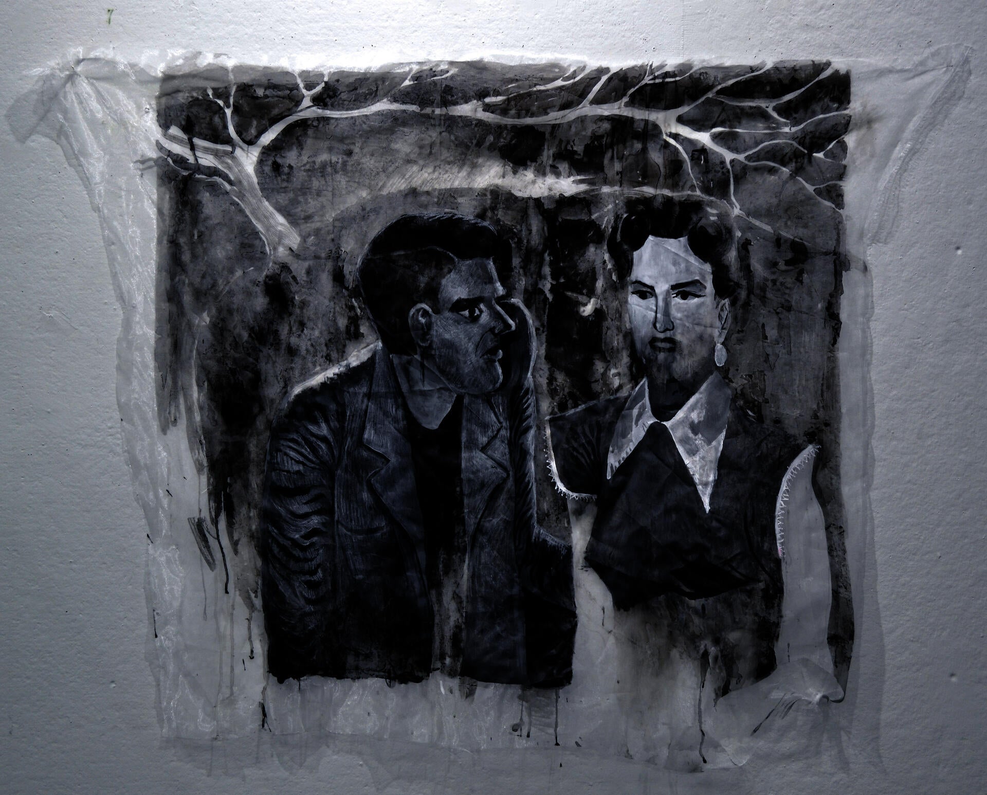 A black and white painting of two figures on transparent fabric. There are patches of opacity and a tree in the background. 