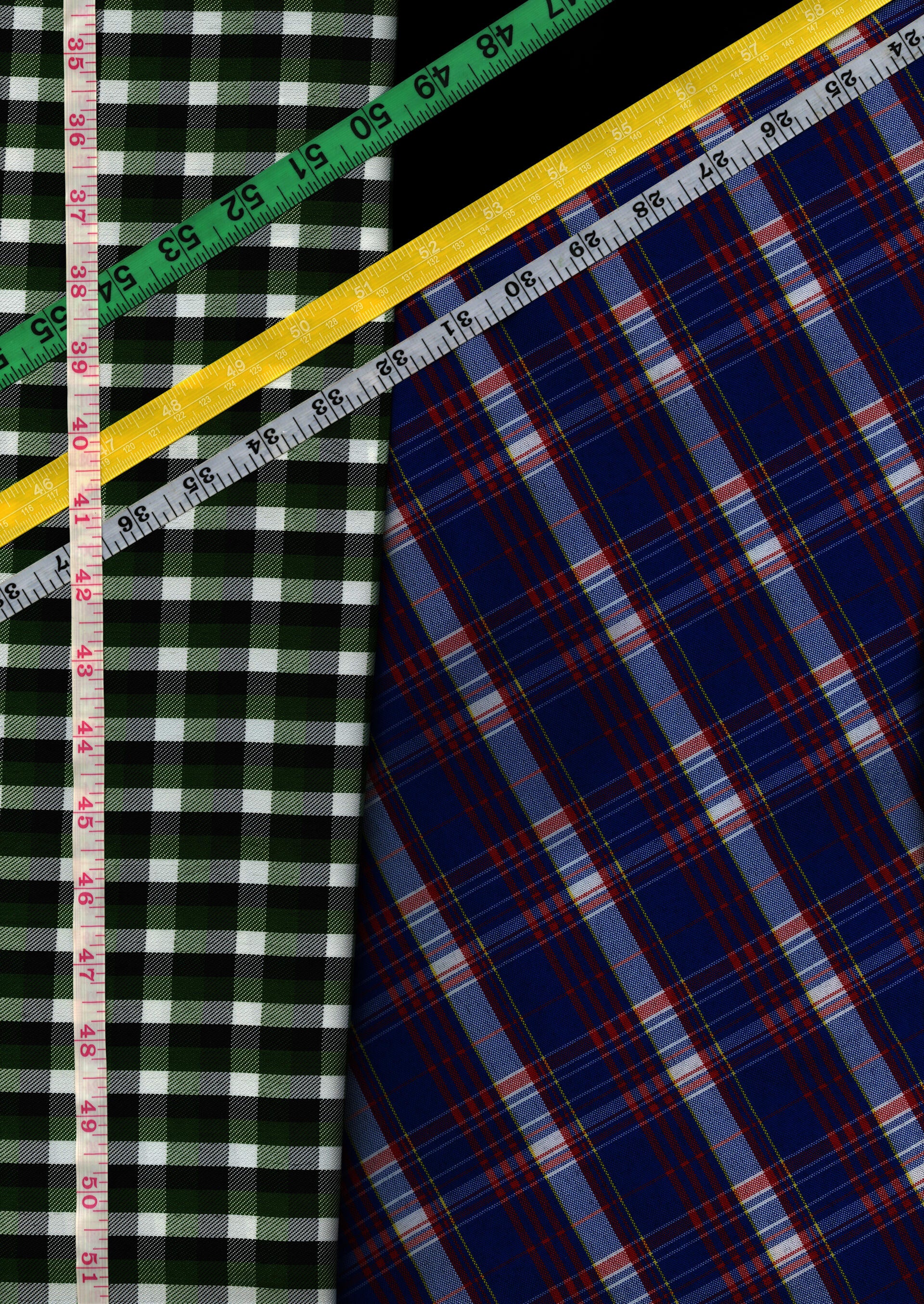 close-up of plaid patterns and rulers
