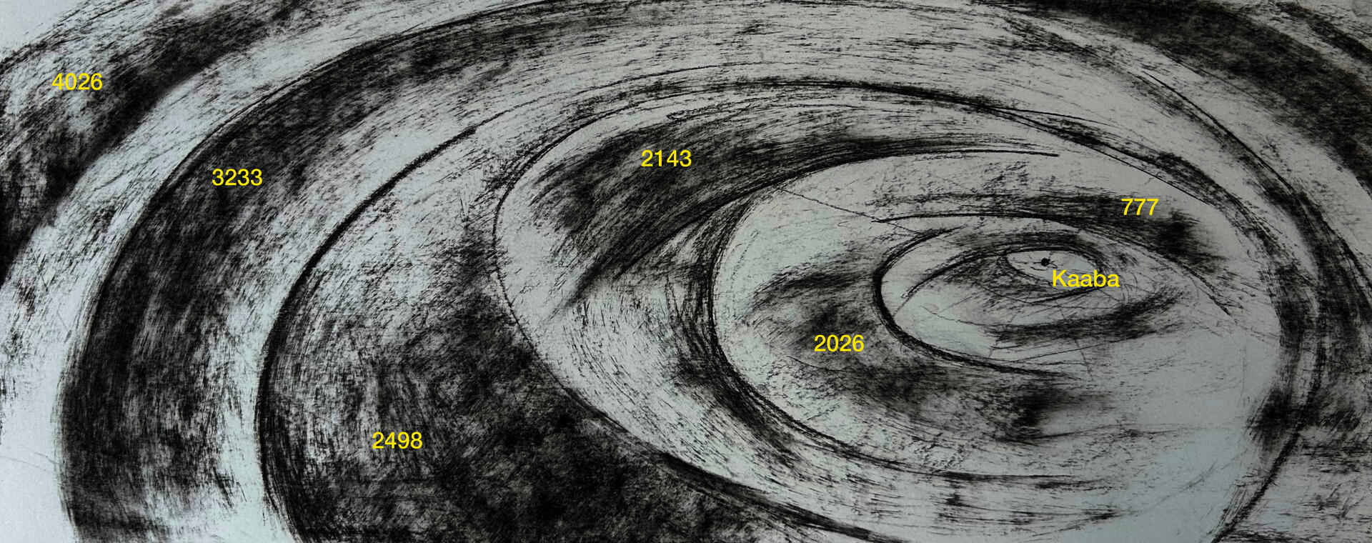 Concentric rings drawn in charcoal. 