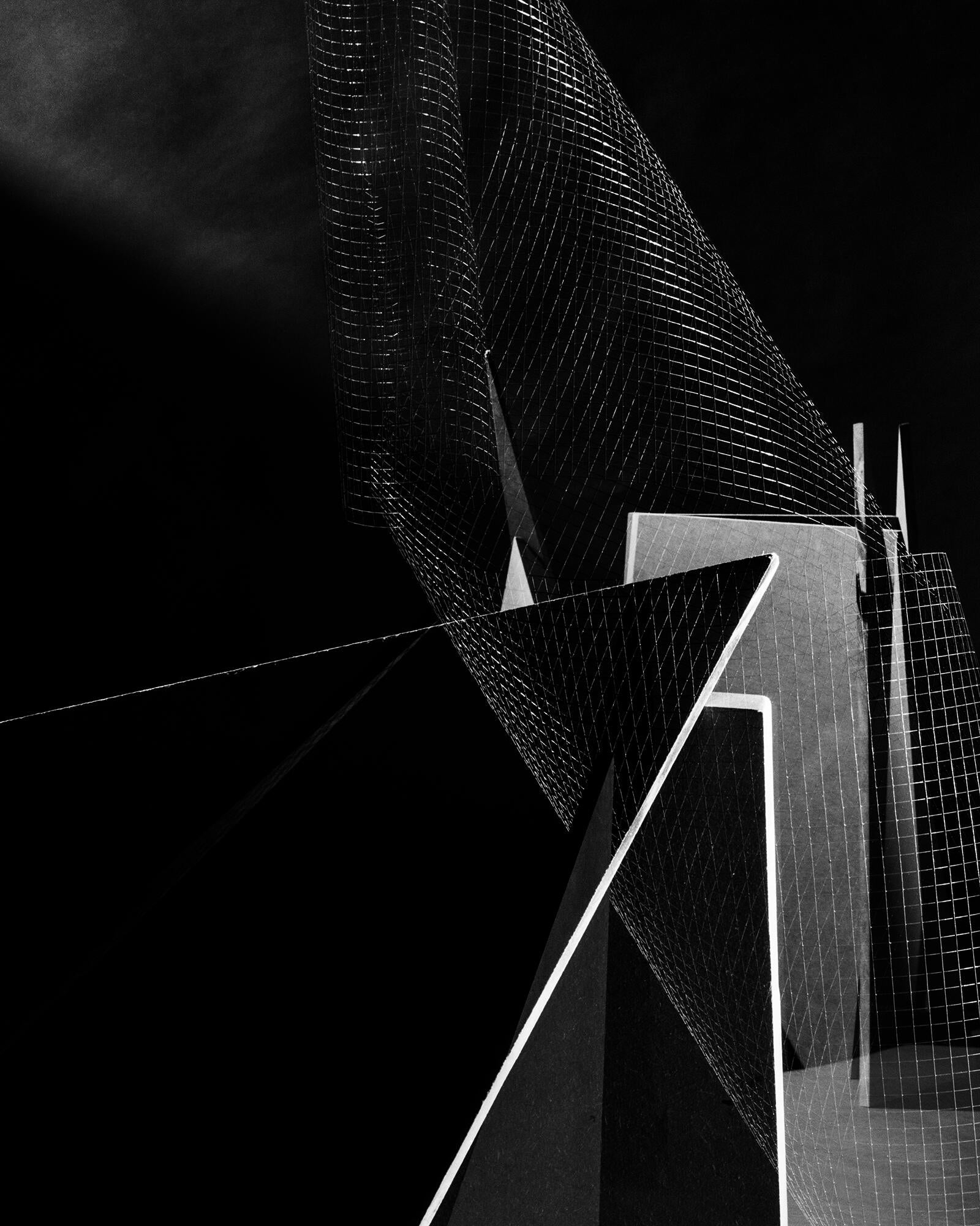 An image of metal mesh and angular shapes producing a strange experience of depth