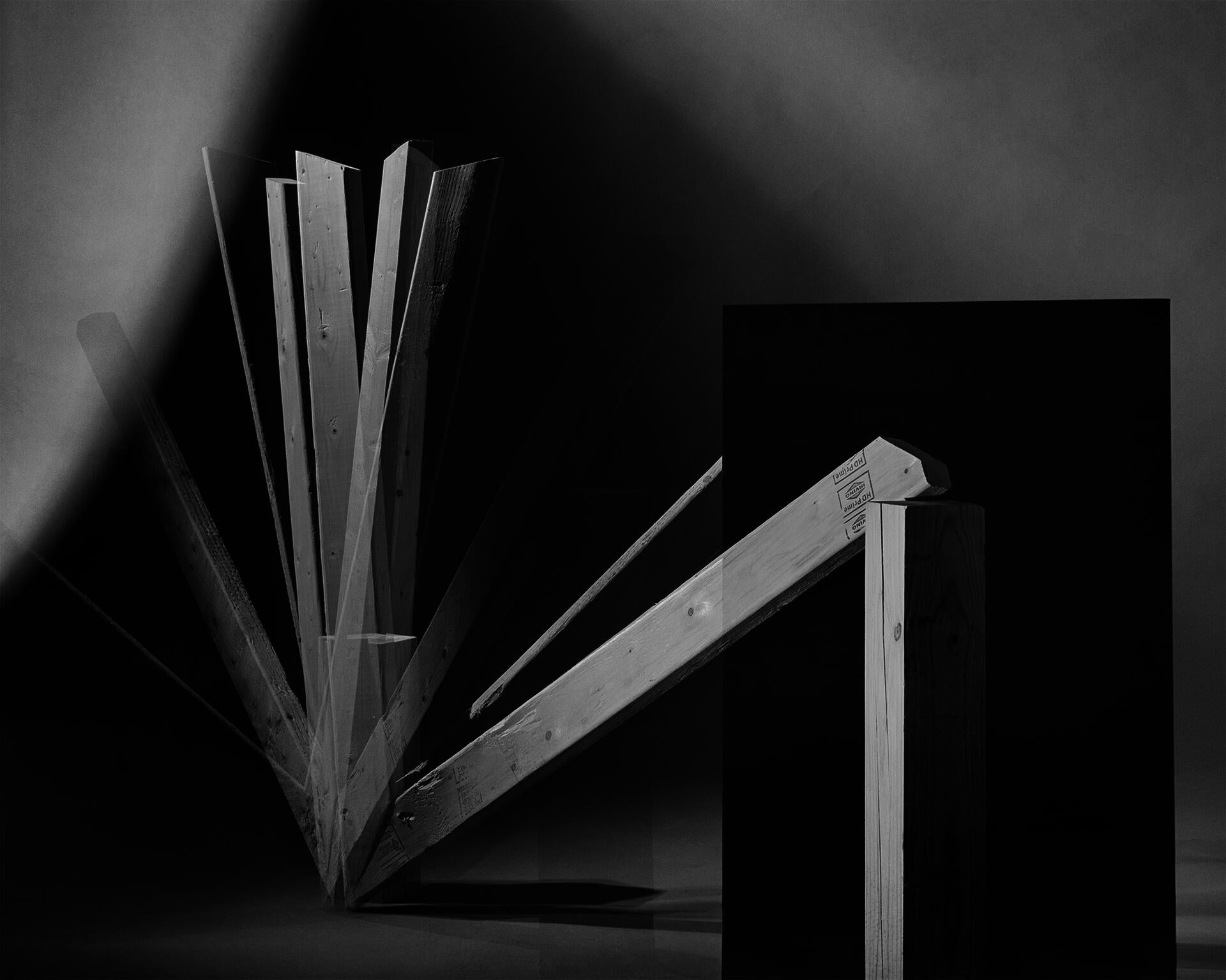 A 2x4 photograph made to look like a fan in motion. 