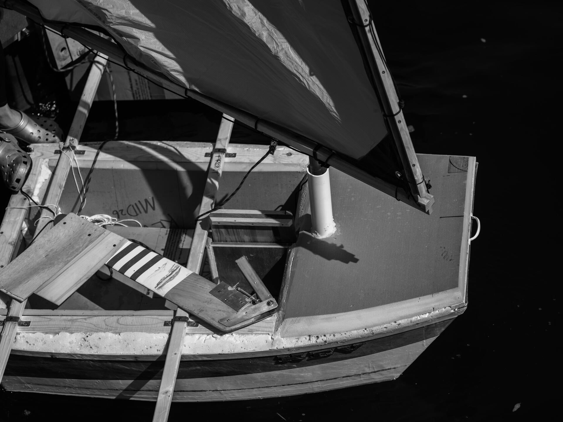 close-up black and white shot of a dinghy