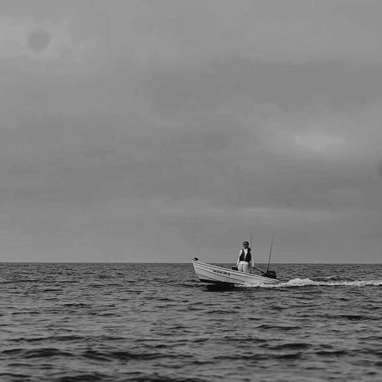black and white shot of a dinghy