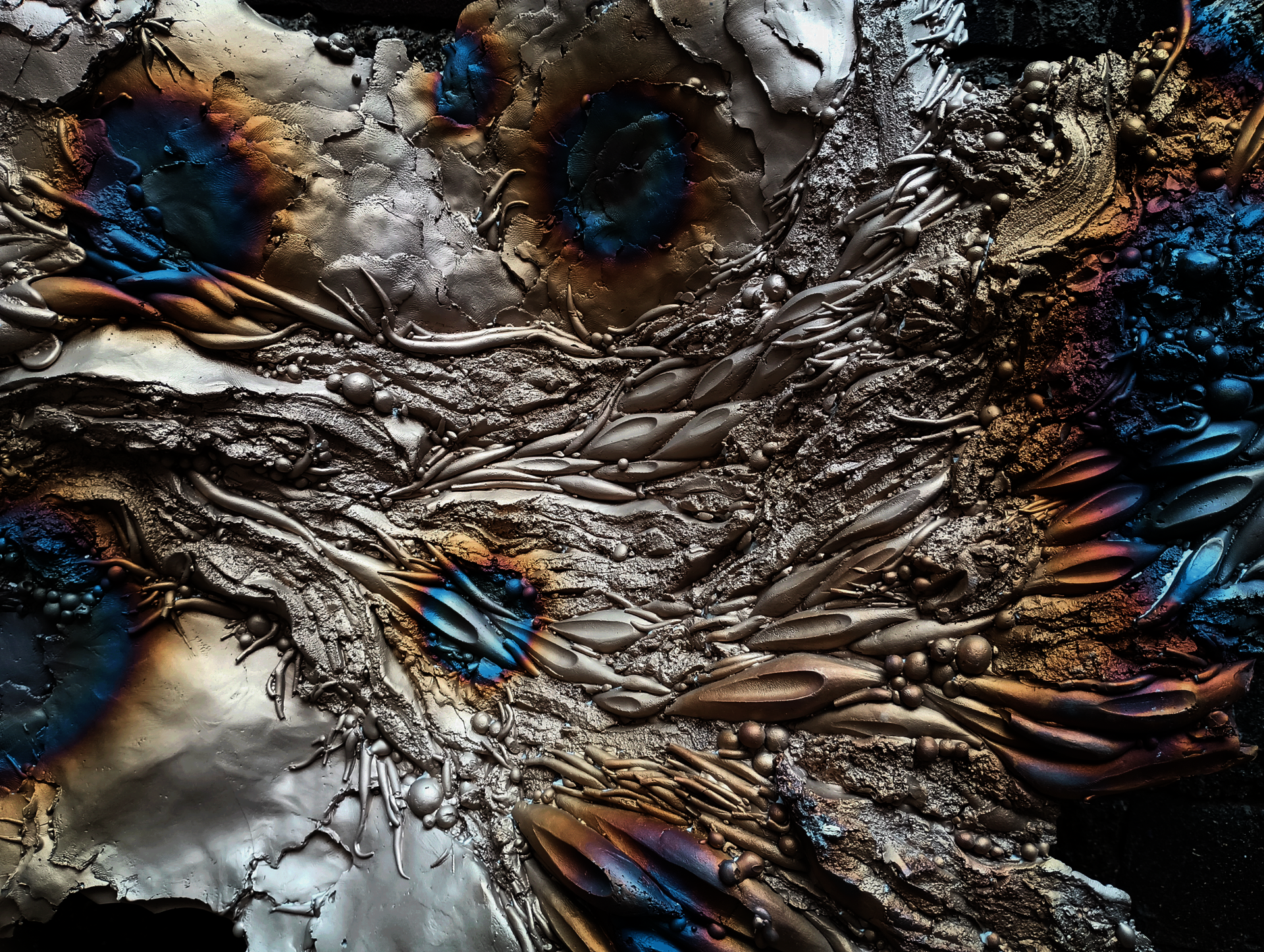 Bronze in progress, detail. Cast bronze with heat auroras.