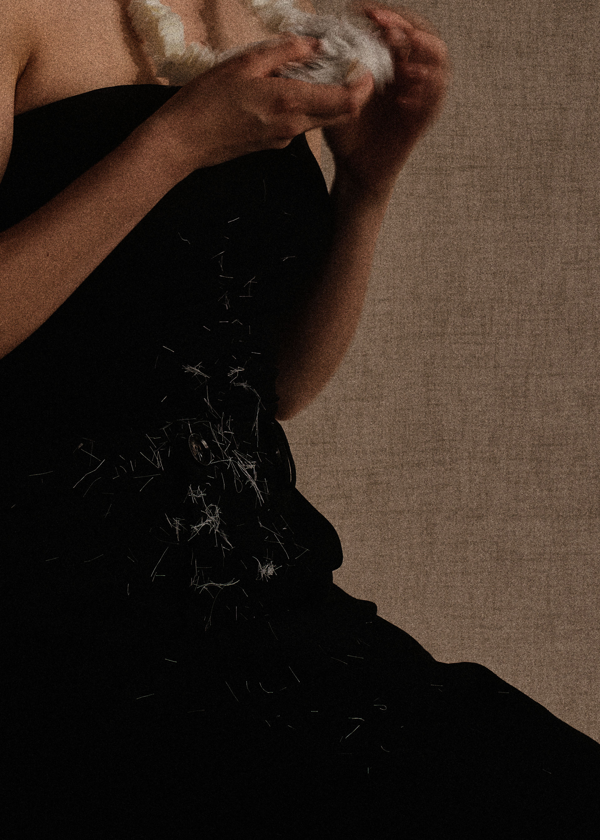 black dress with hands holding fabric