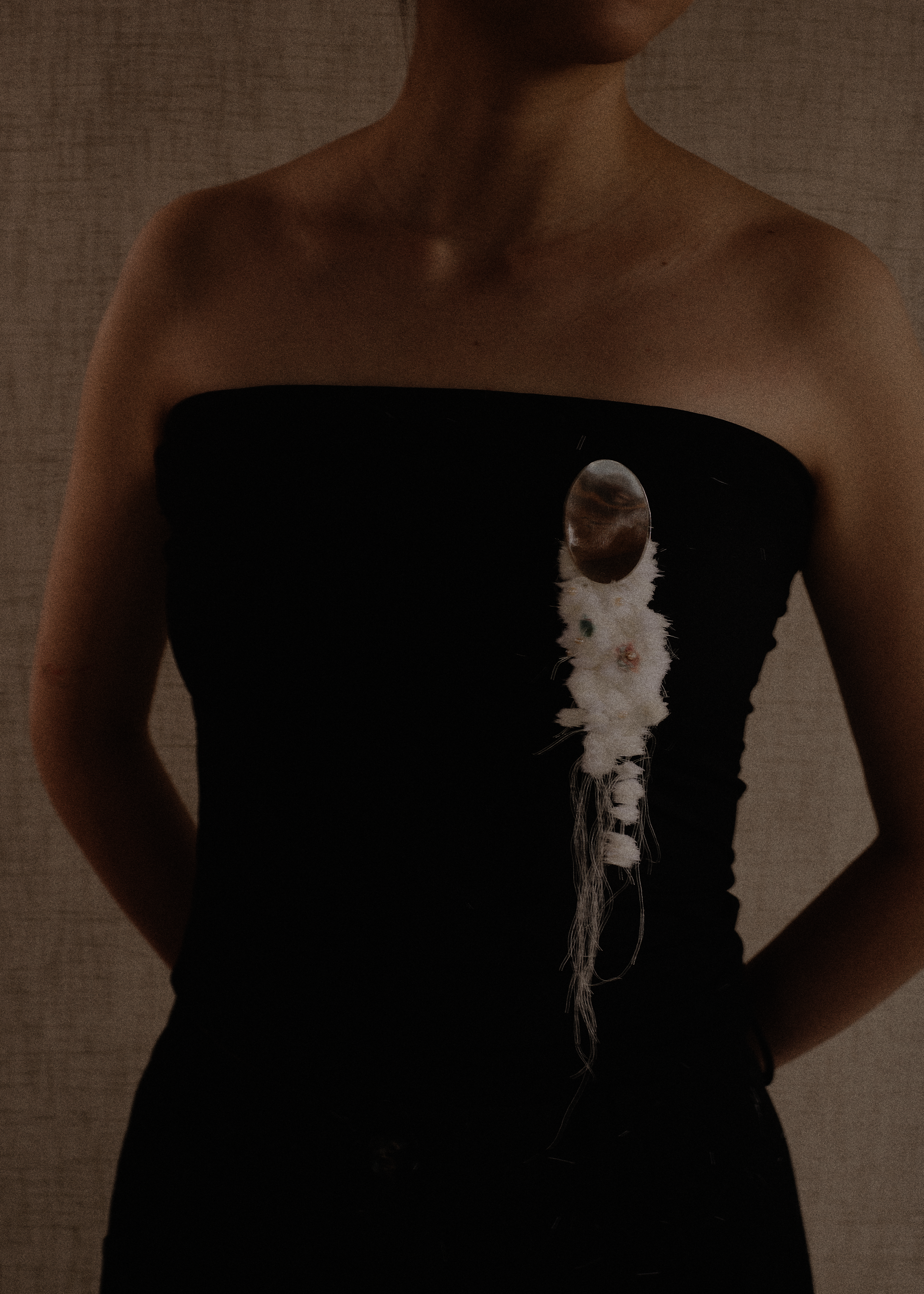 black dress with beaded broach