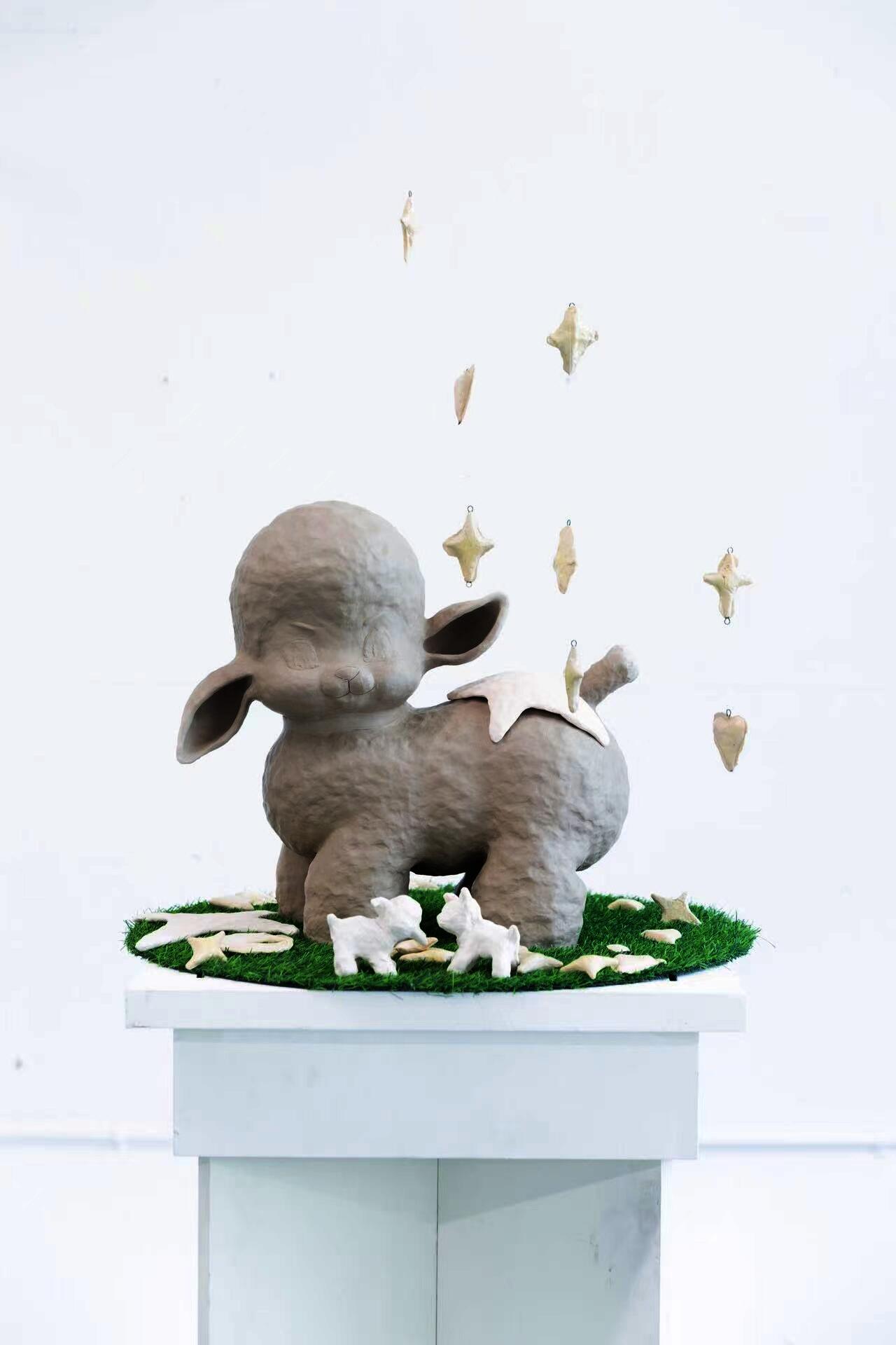 Enlarged vintage lamb toy with stars and hearts. 