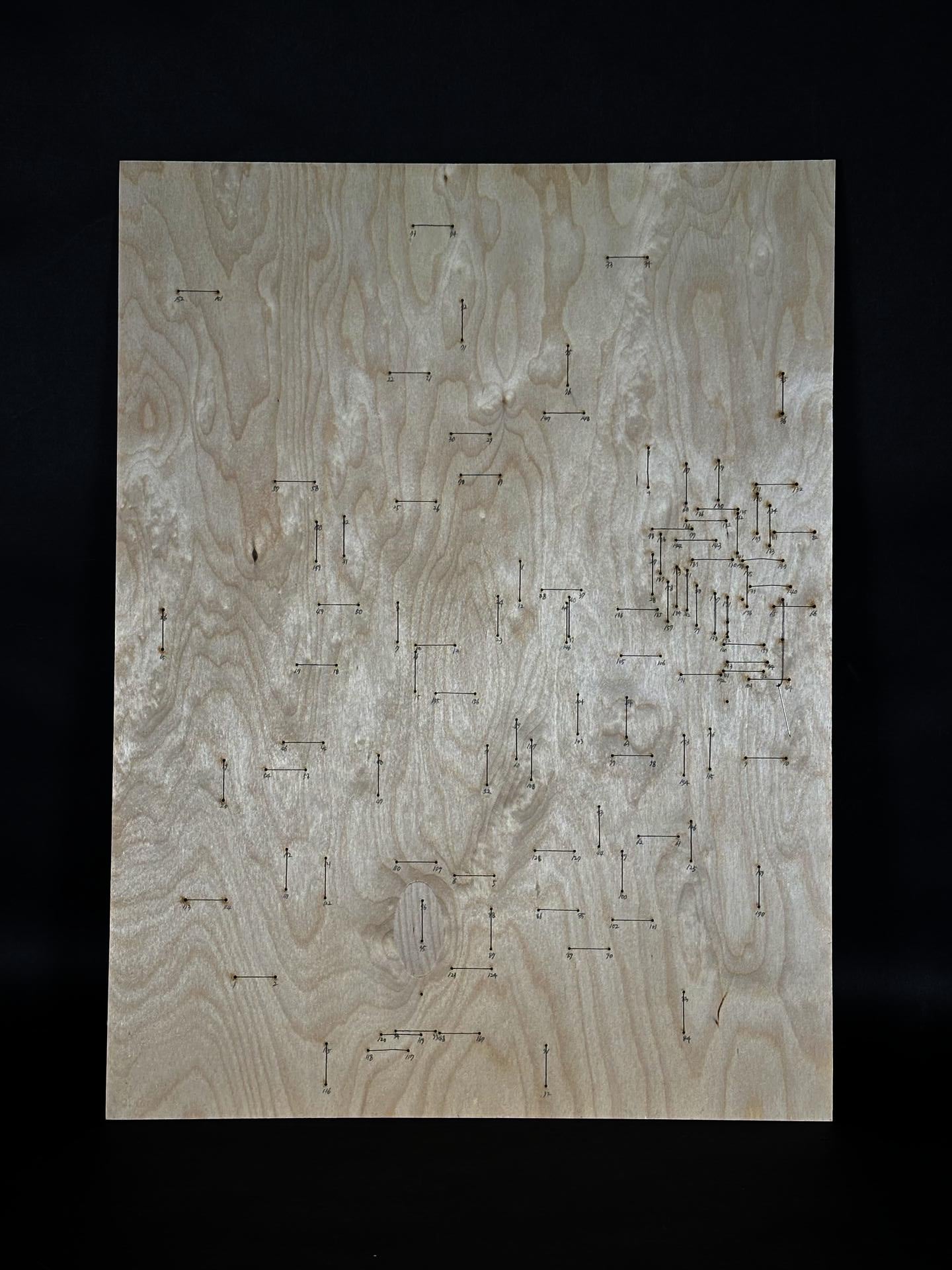 The front side reveals how orderly the stitching process can appear. Each pair of dots is connected by a one-inch line following a specific direction, while the sequence is carefully documented through numbering.