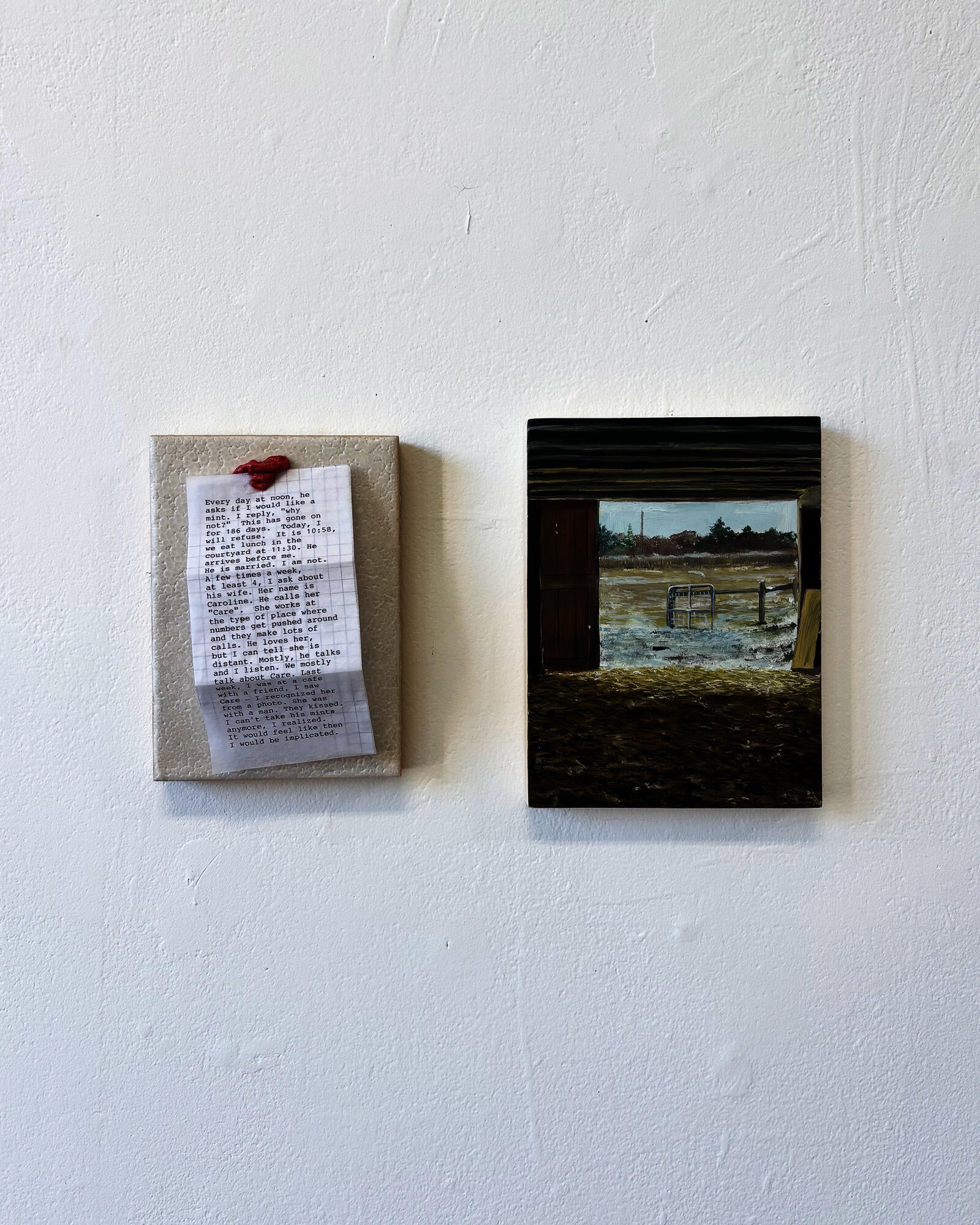 On the left, a rectangular panel has a note attached to a cracked white surface. On the right, is a rectangular painting of a landscape. 