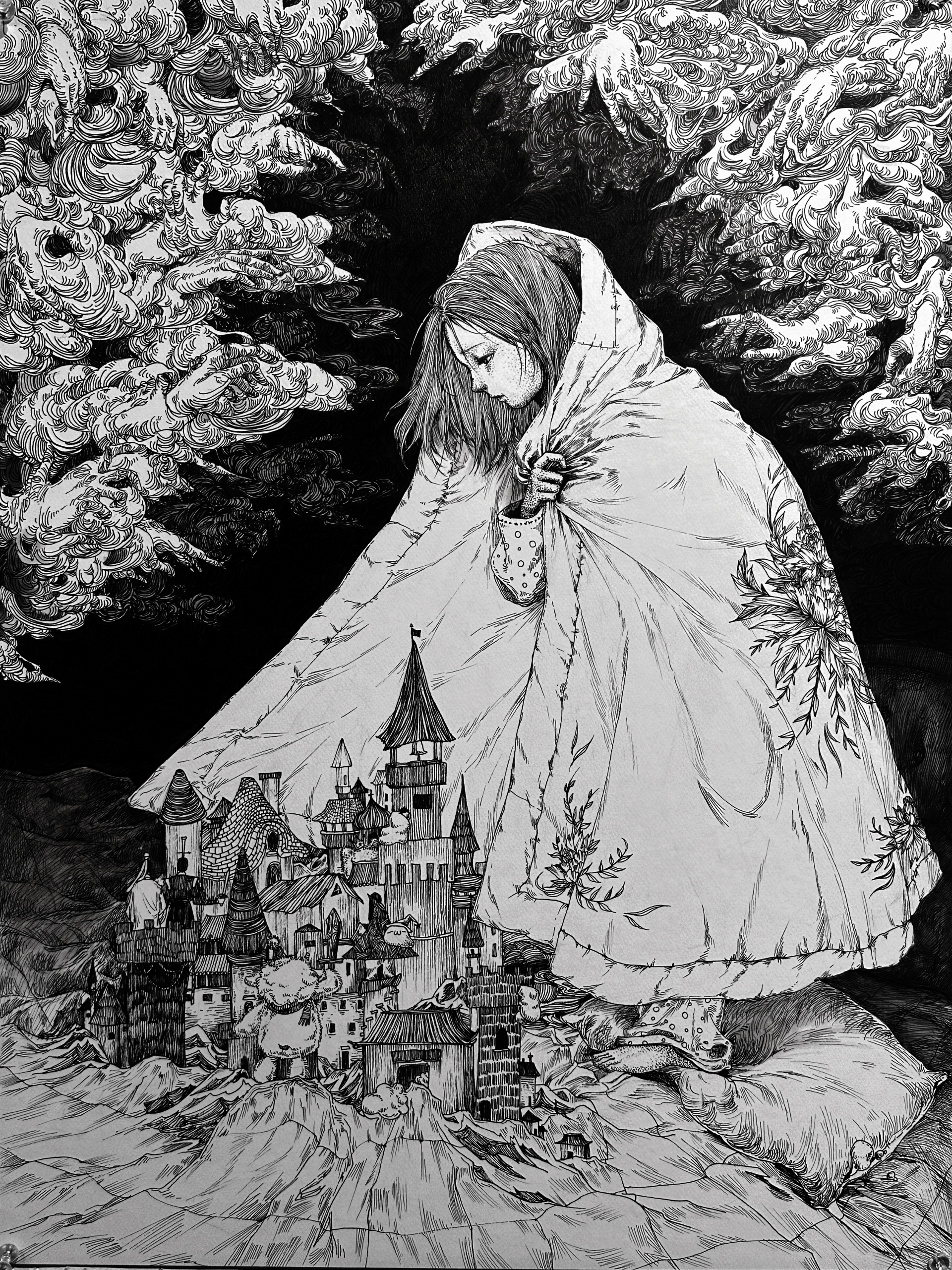 Black-and-white drawing. A giant girl in a floral blanket looks down at a tiny castle on pillows. Swirling, dark clouds shaped like reaching hands loom in the sky above.