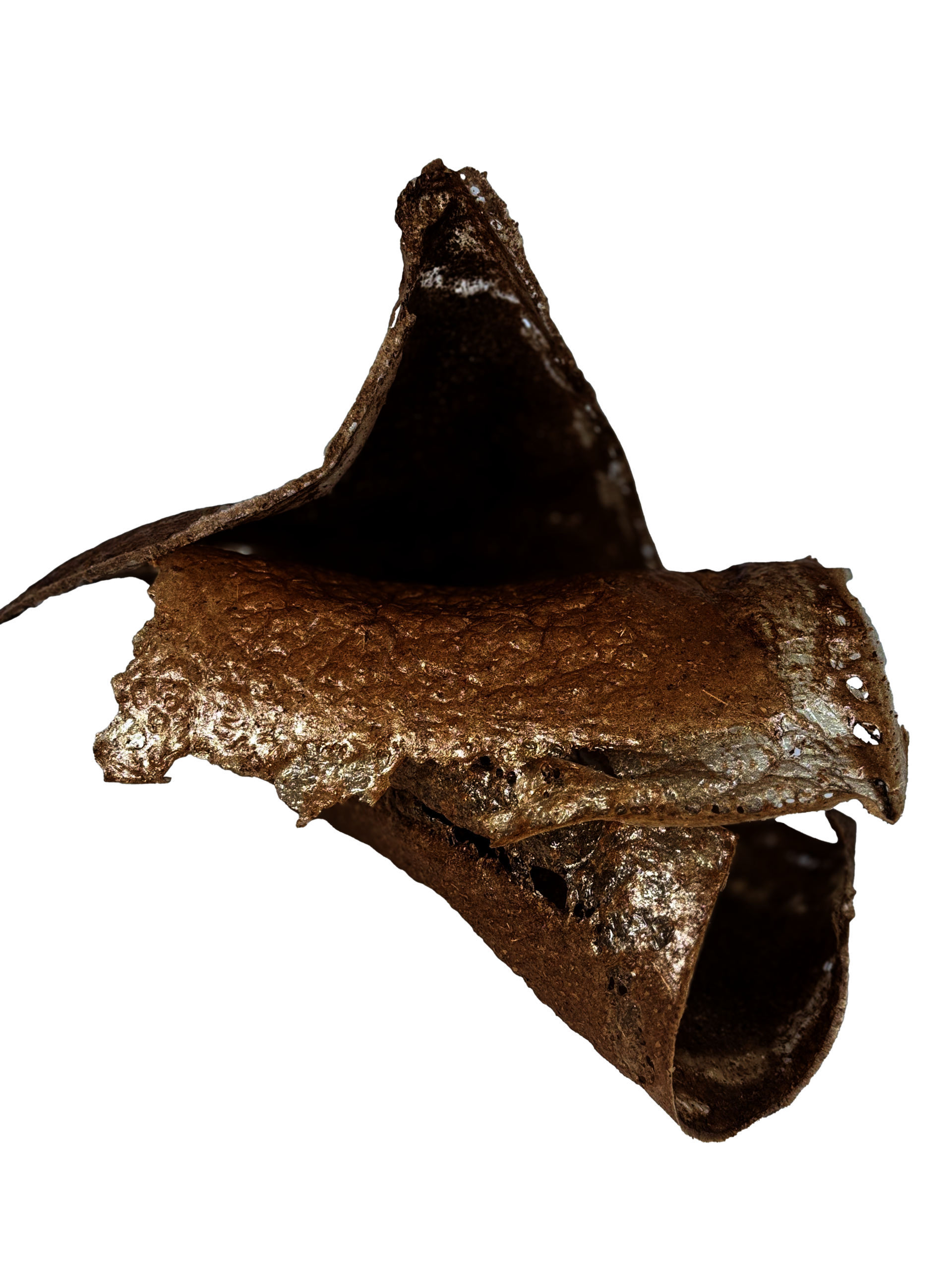 Stacked pieces of leaf bio-composite, warm brown with a glossy, textured surface. The top piece rises to a peak; the lower pieces curl.