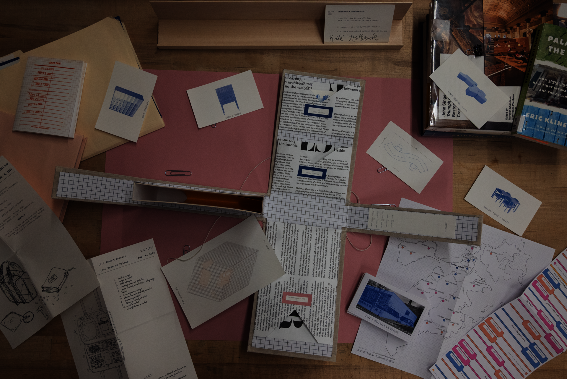 an image of various colored and sized papers scattered on a desk 
