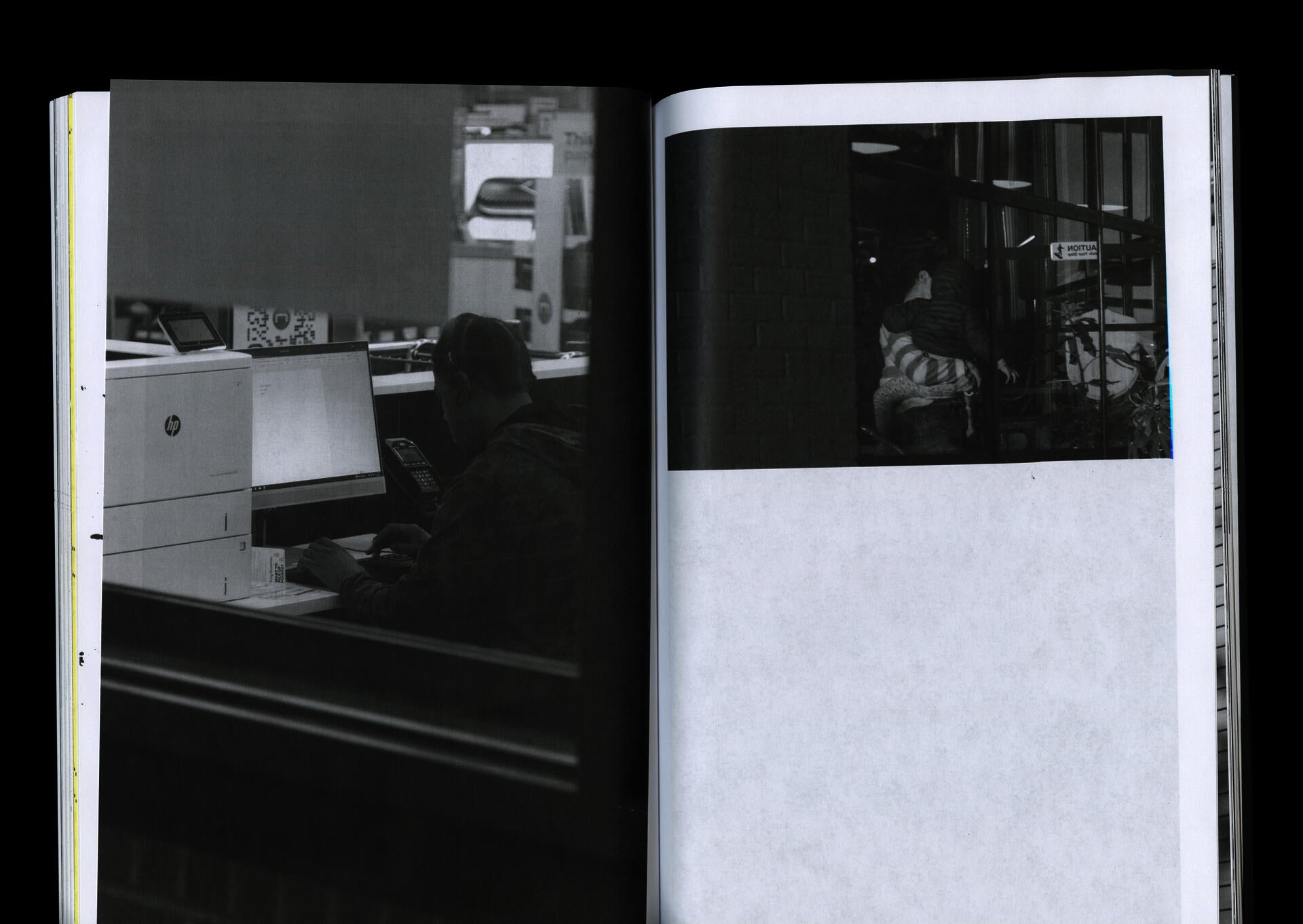 Publication spread with two black and white photographs: left page shows person at a computer in office setting; right page depicts figures entering building entrance.