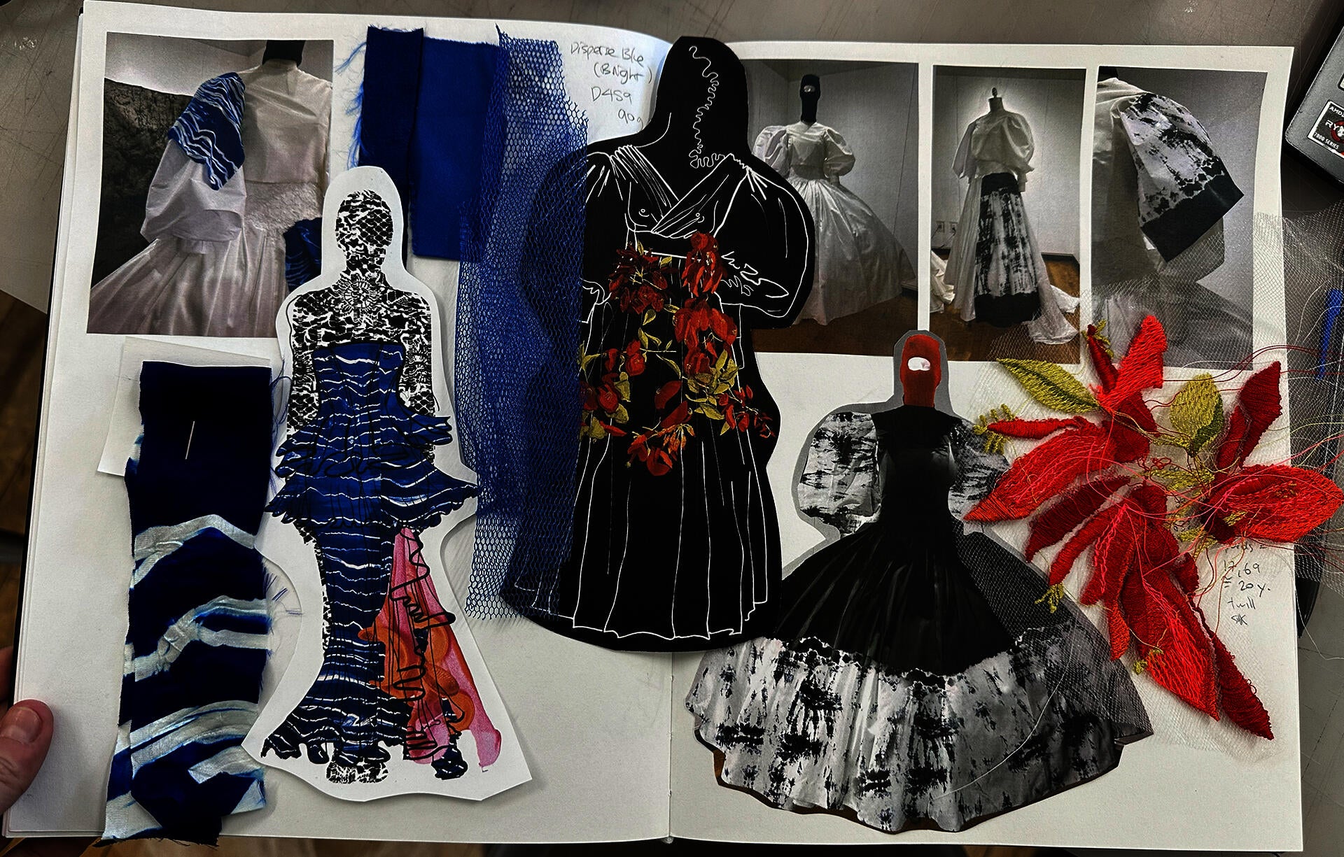 Sketchbook showing design process with collage of sketches, garment photos, textile swatches, fabric samples, and red embroidered floral tests